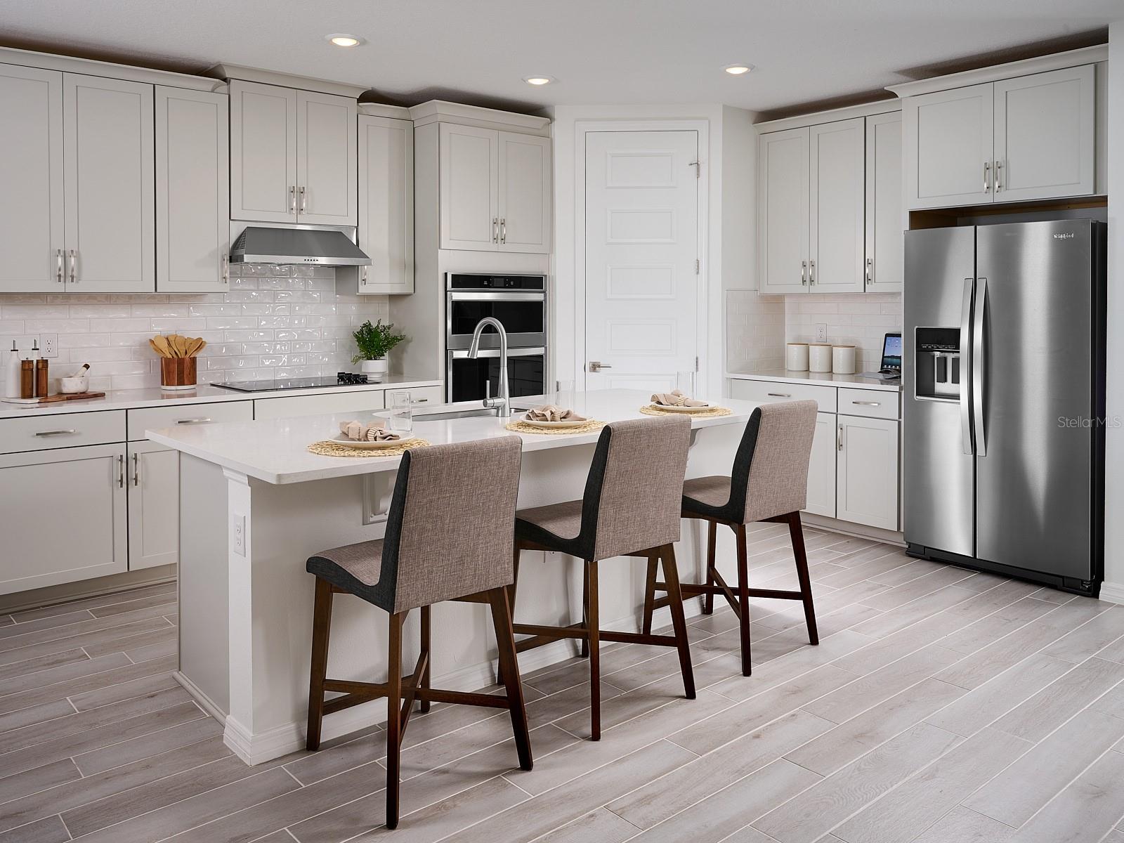 Photos are not of the actual home, but are photos of the builder home with same floorplan with similar interior finishes.