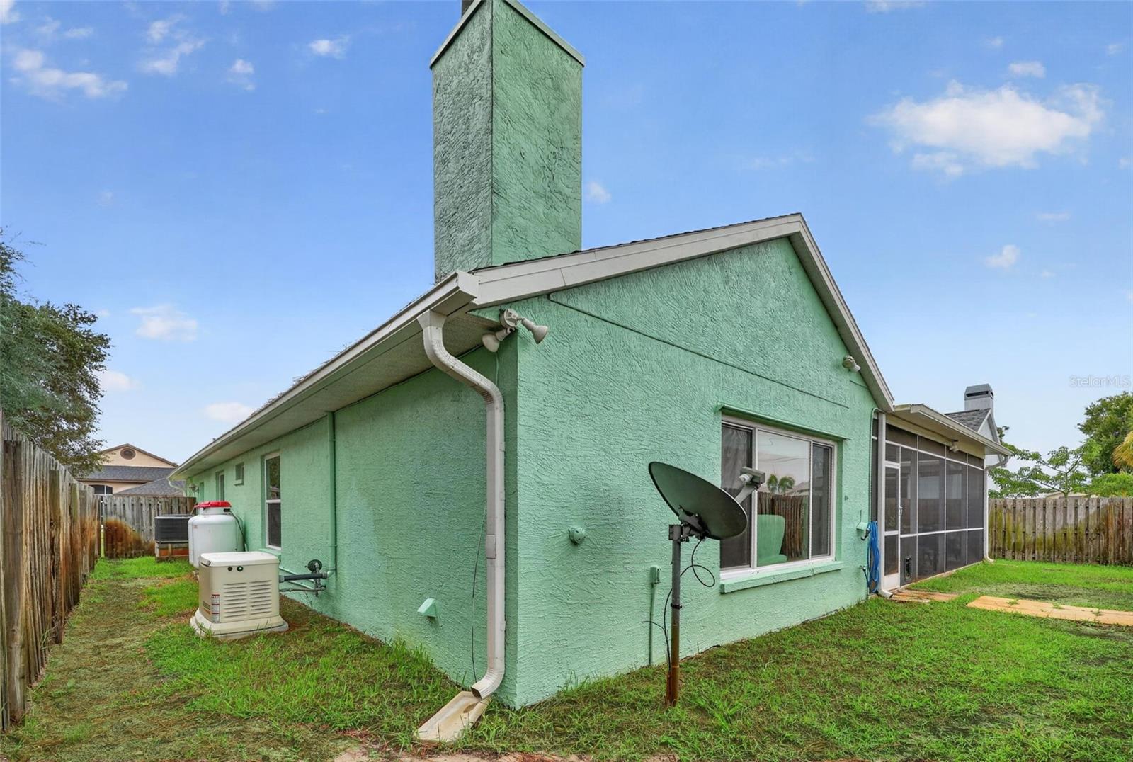 The property has enough yard area, fenced and a genrac full house generator.