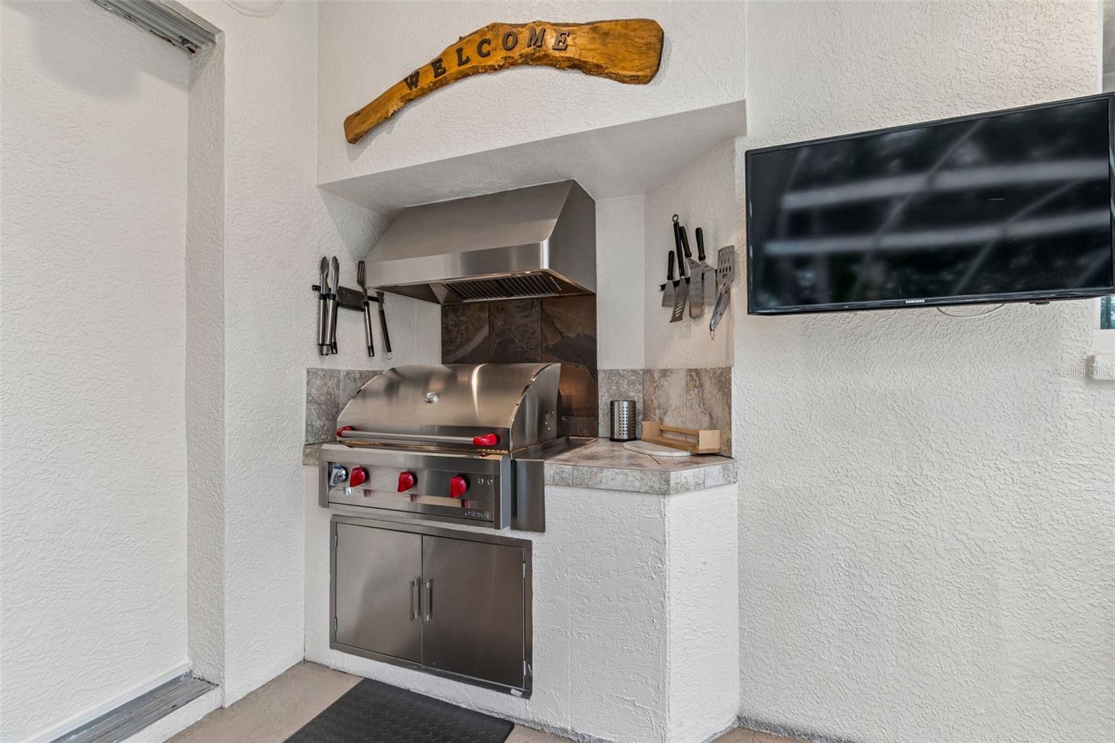 You'll enjoy this New Artison Propane Stove & Grill with the New Hood that vents to the exterior through the roof.