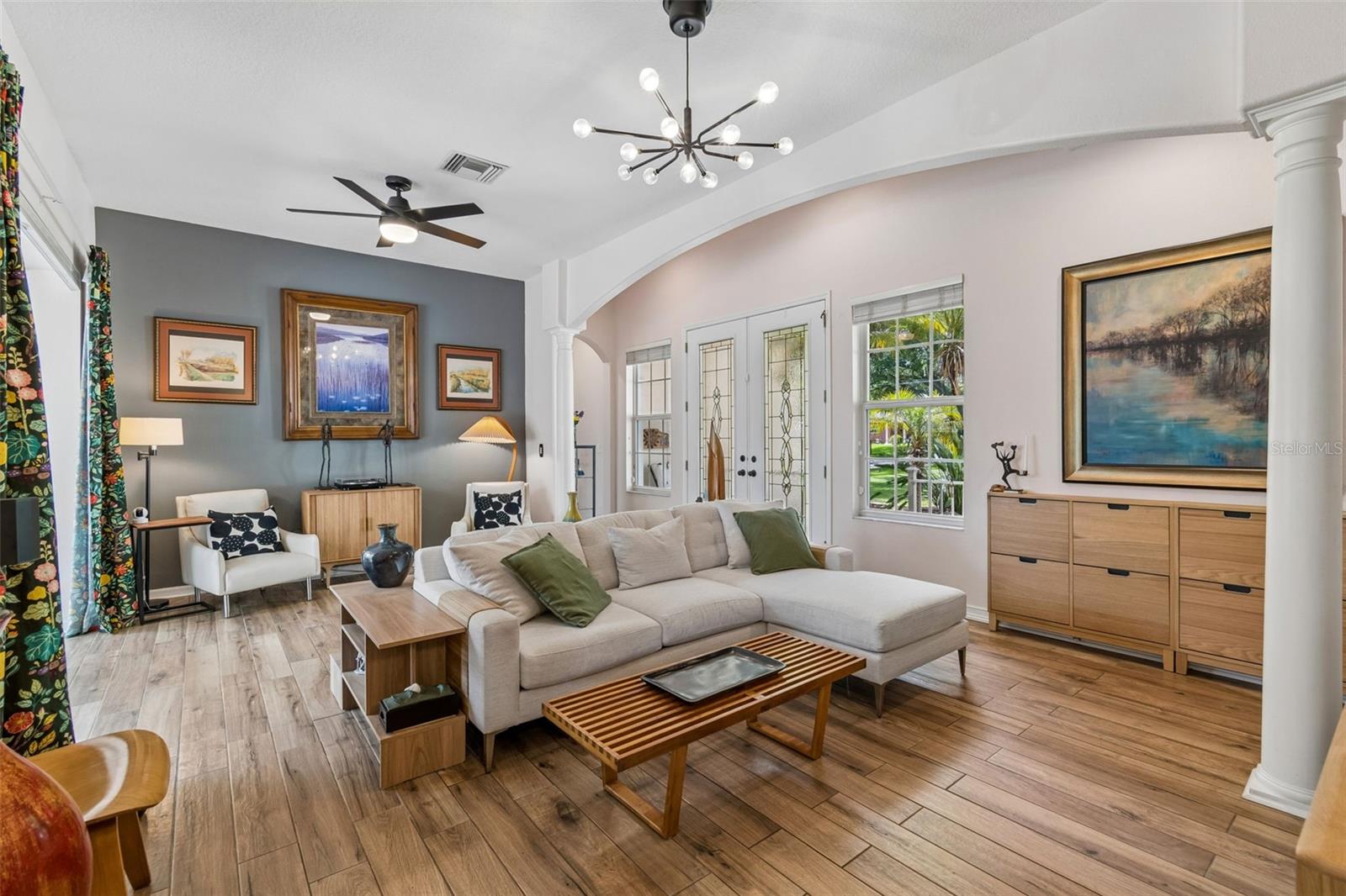 Formal Living Room with High Ceilings and Room for several seating areas.