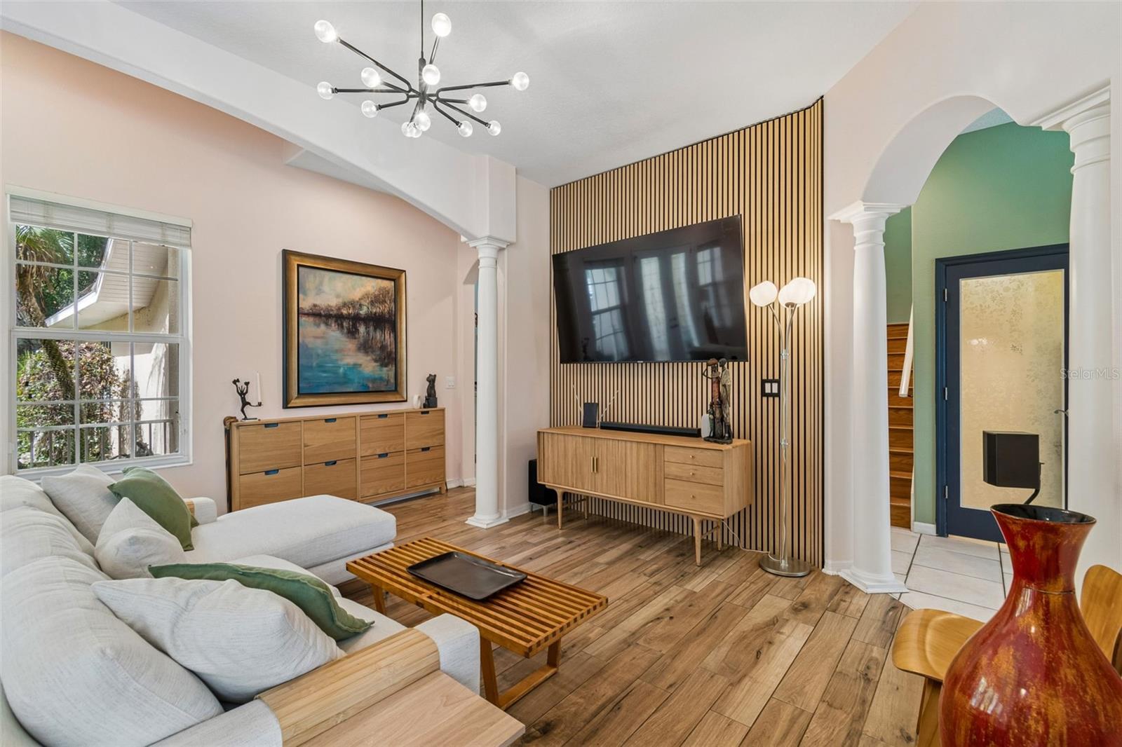 As Music Lovers, the Sellers added this Natural African Walnut Acoustic Slat Wood Panel that adds both Visual Texture and Sound Absorption.