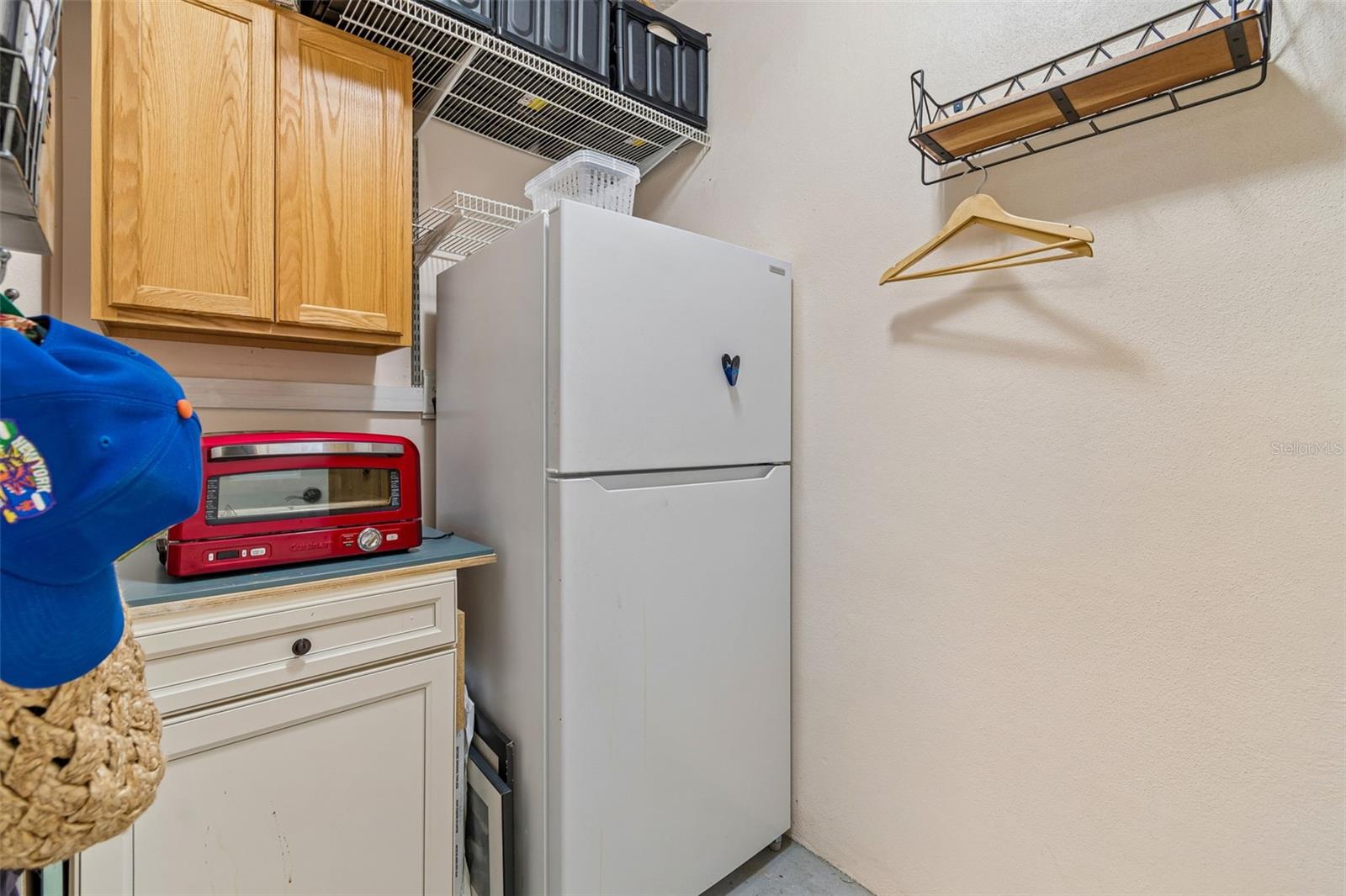 Air Conditioned 5 X 10 Room in the garage is the perfect space for appliances or make this an office, studio or workshop