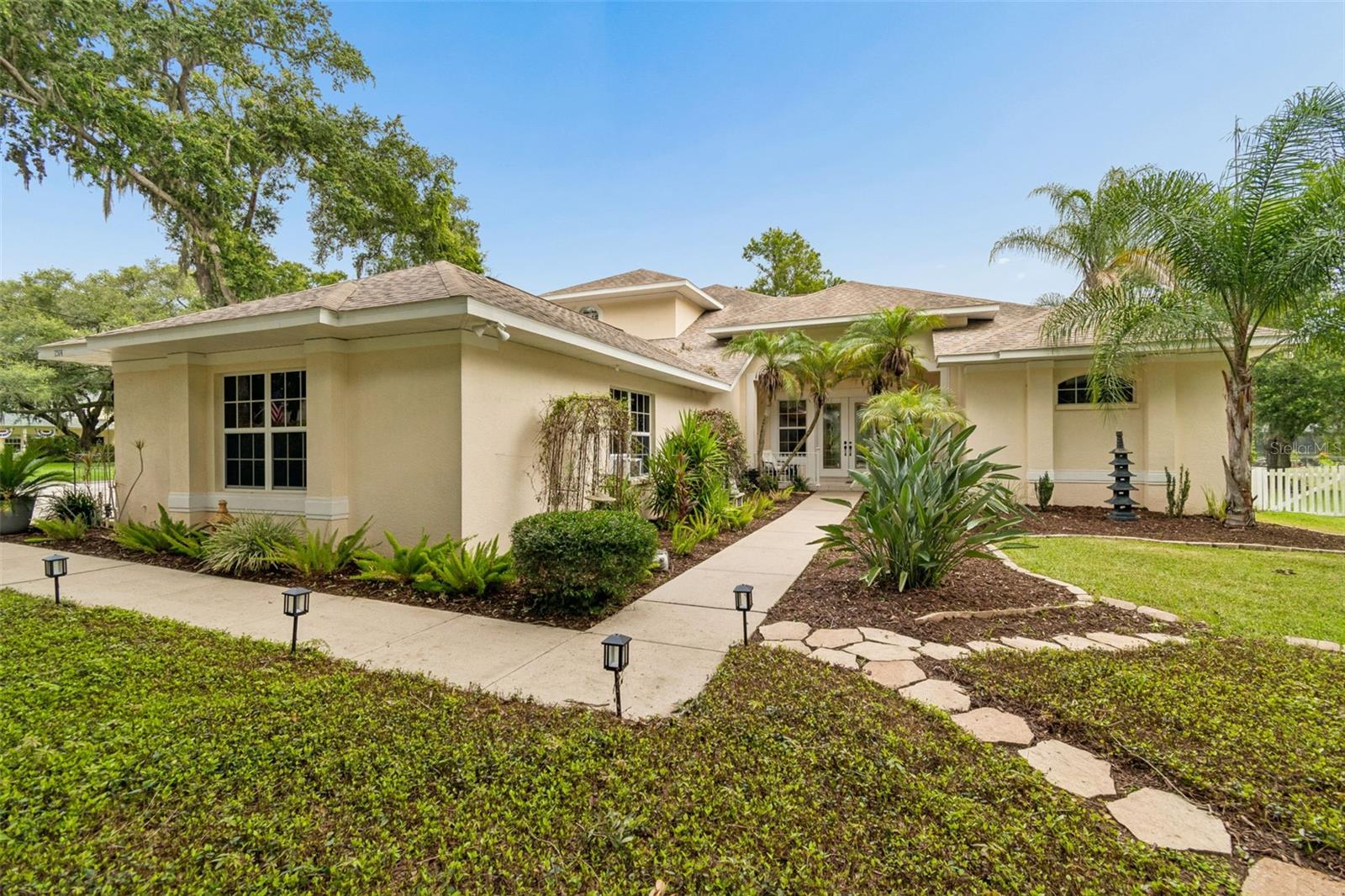 This home features a Side-Load Garage, so the front yard stays peaceful and natural.