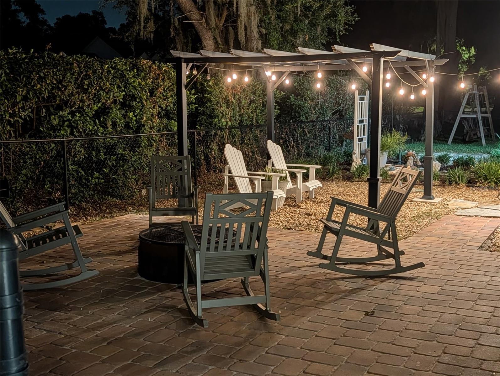 Enjoy Enchanting Evenings with your favorite people in your Courtyard with your lovely Pergola and Fire Pit.