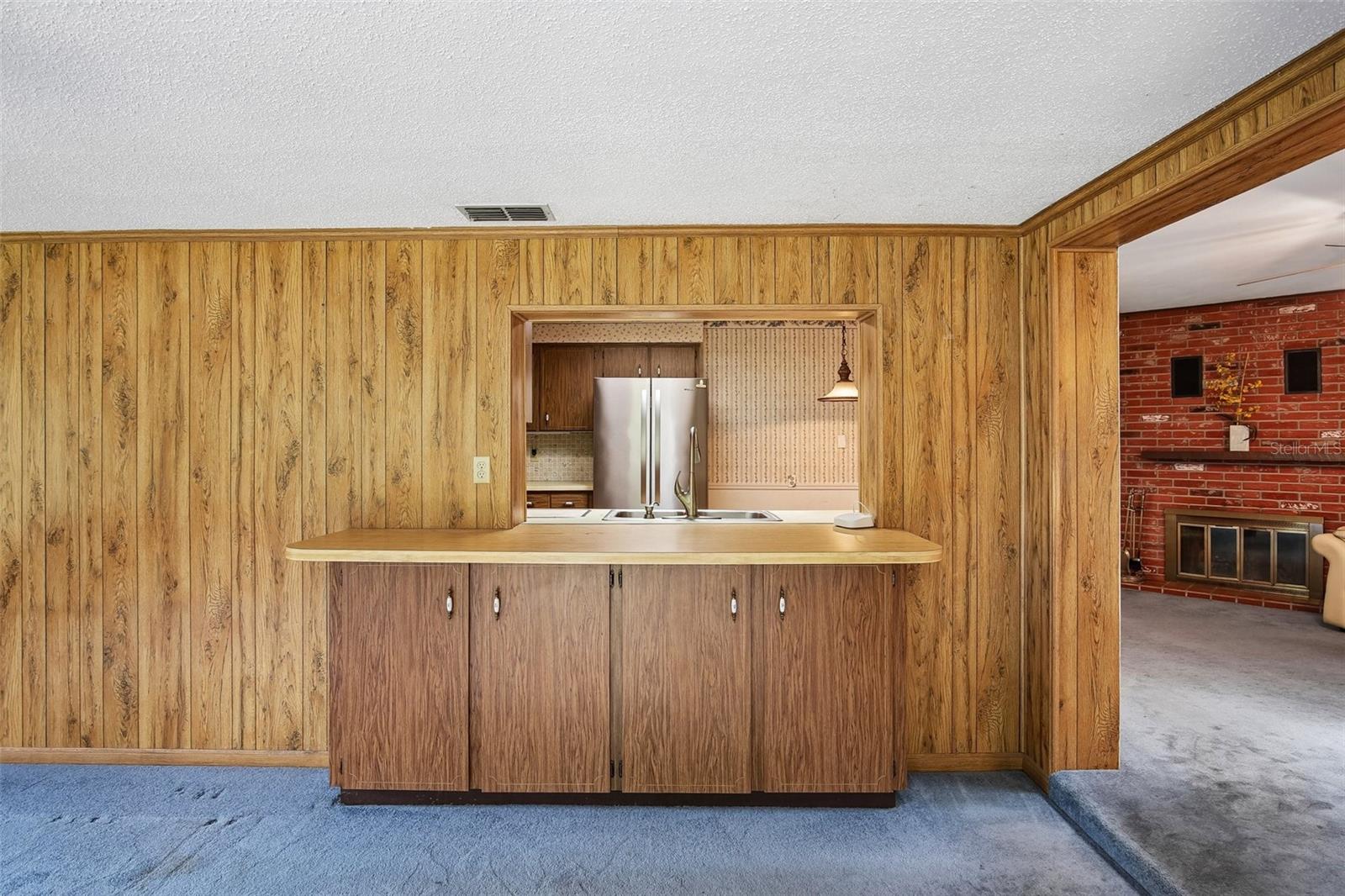 Family room with kitchen pass-through