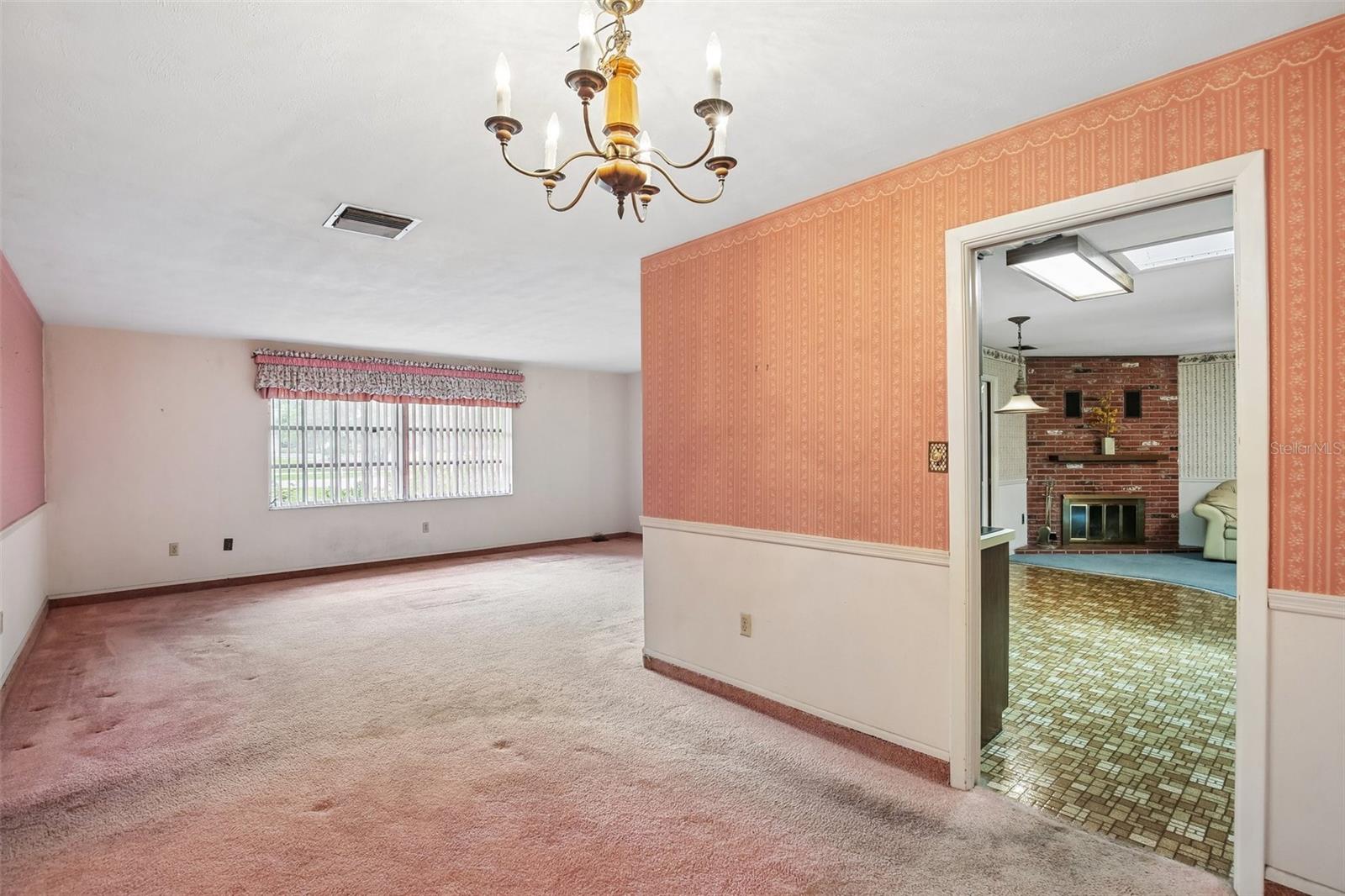 Dining room connects to formal LR and kitchen