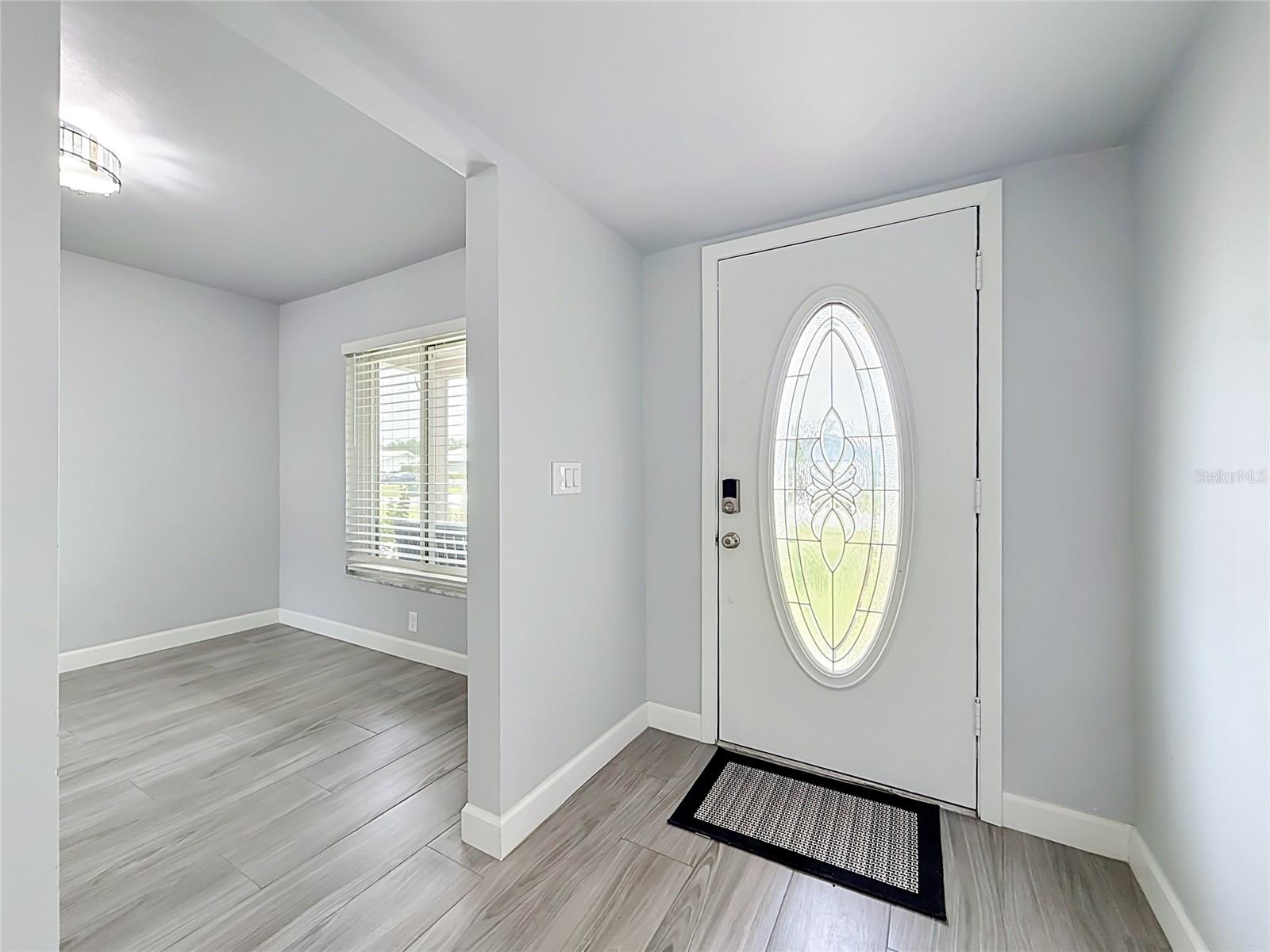 Foyer entry and dining room