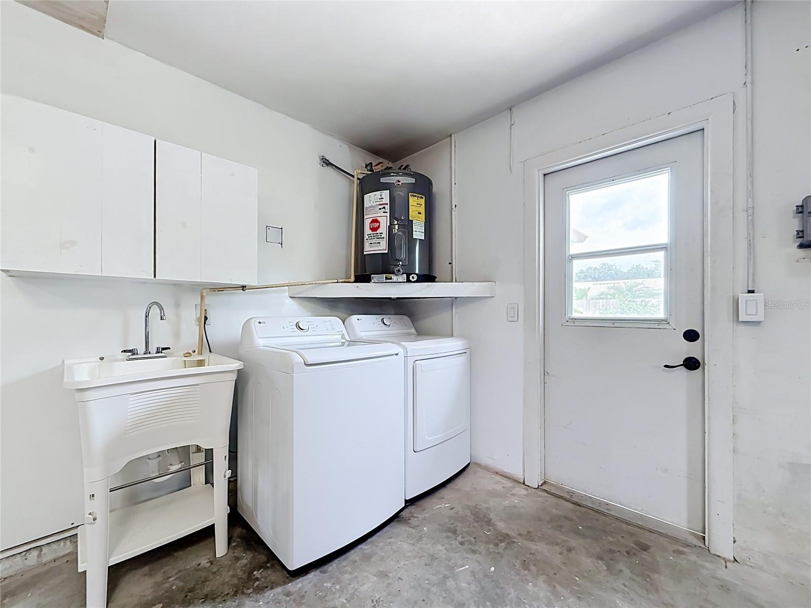 Garage laundry-new appliances and utility sink