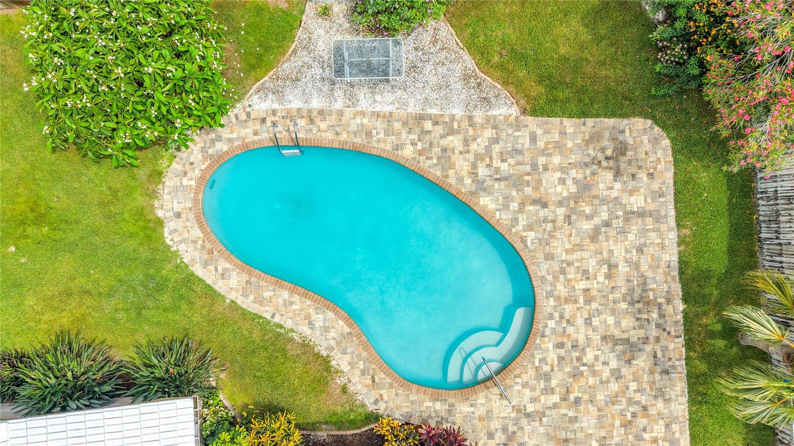 Pool with new pavers and recent resurface