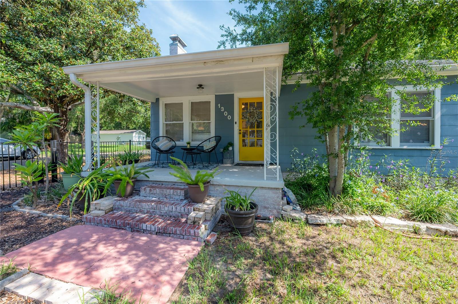 Appealing and welcoming front porch, perfect in a neighborhood known for its Front Porch neighbor gatherings