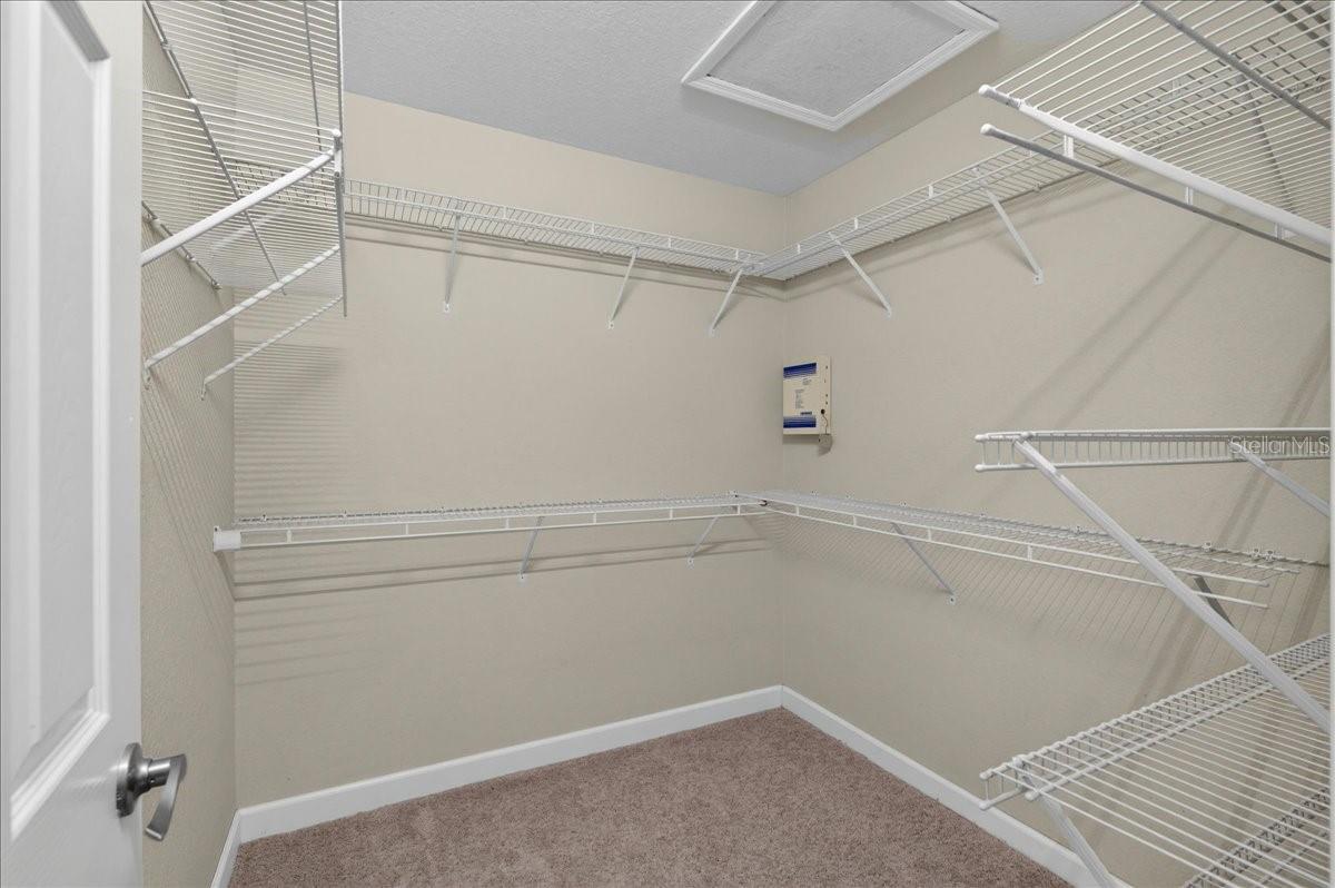 Primary Bedroom walk-in closet