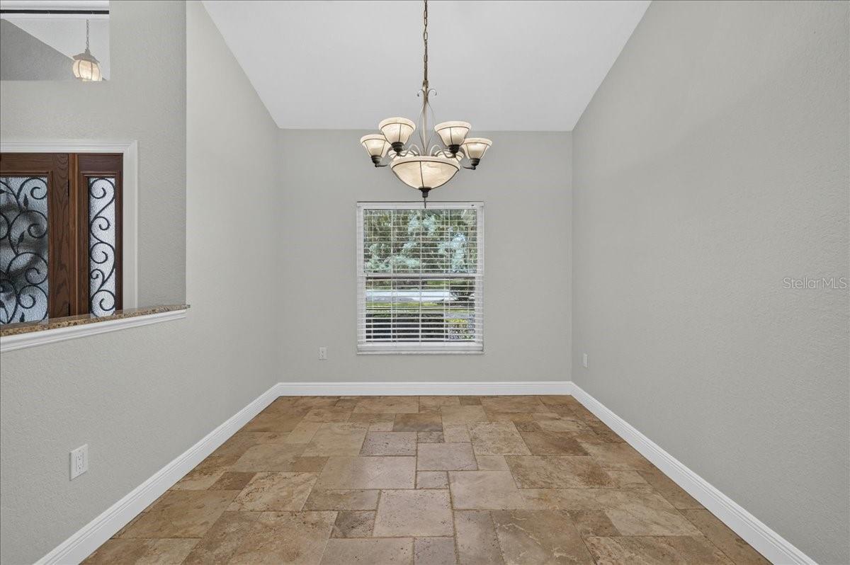 The formal dining room is just off the foyer with convenient flow from the living room and kitchen.