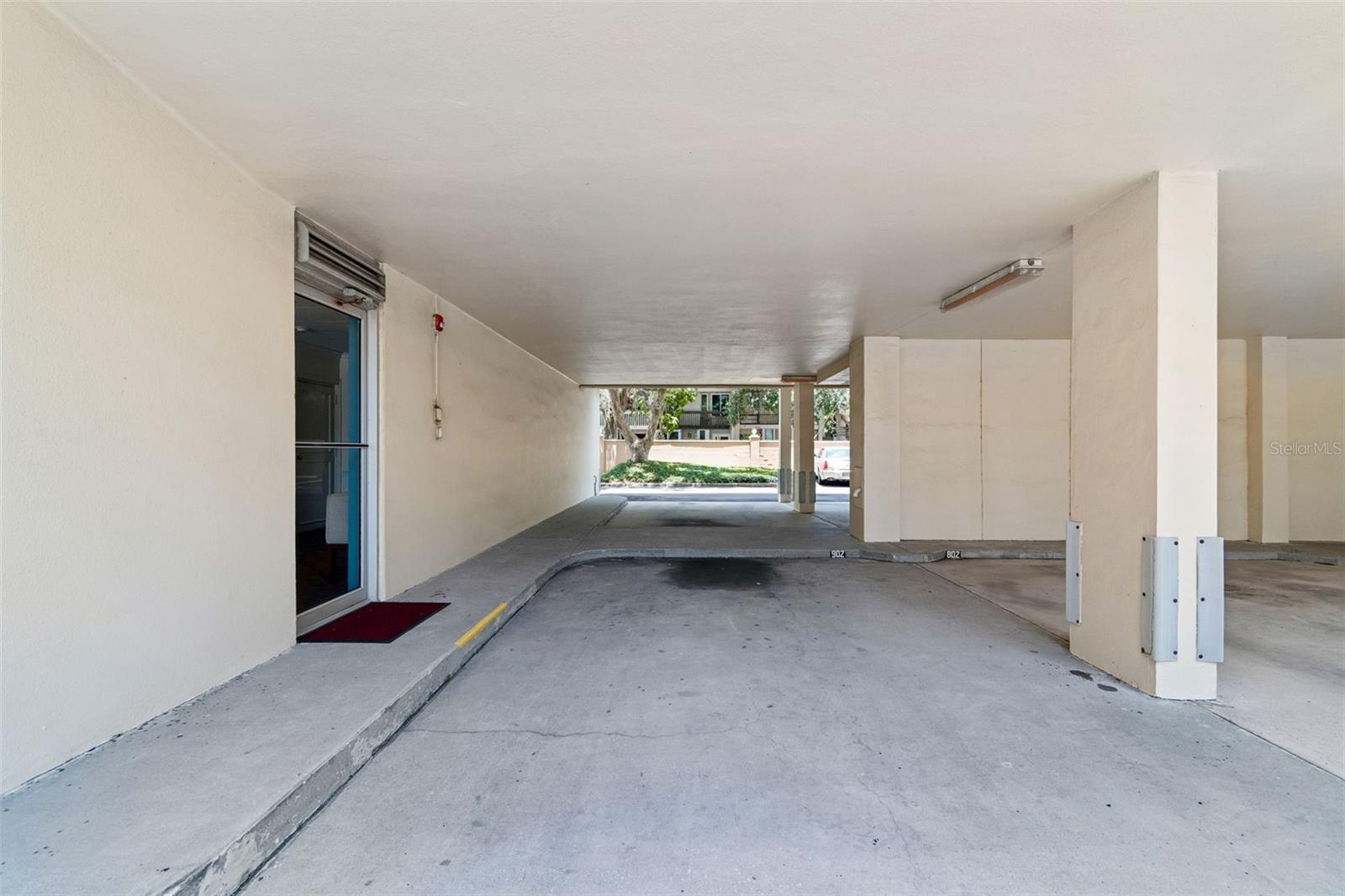 Parking space directly next to entrance to the condo.