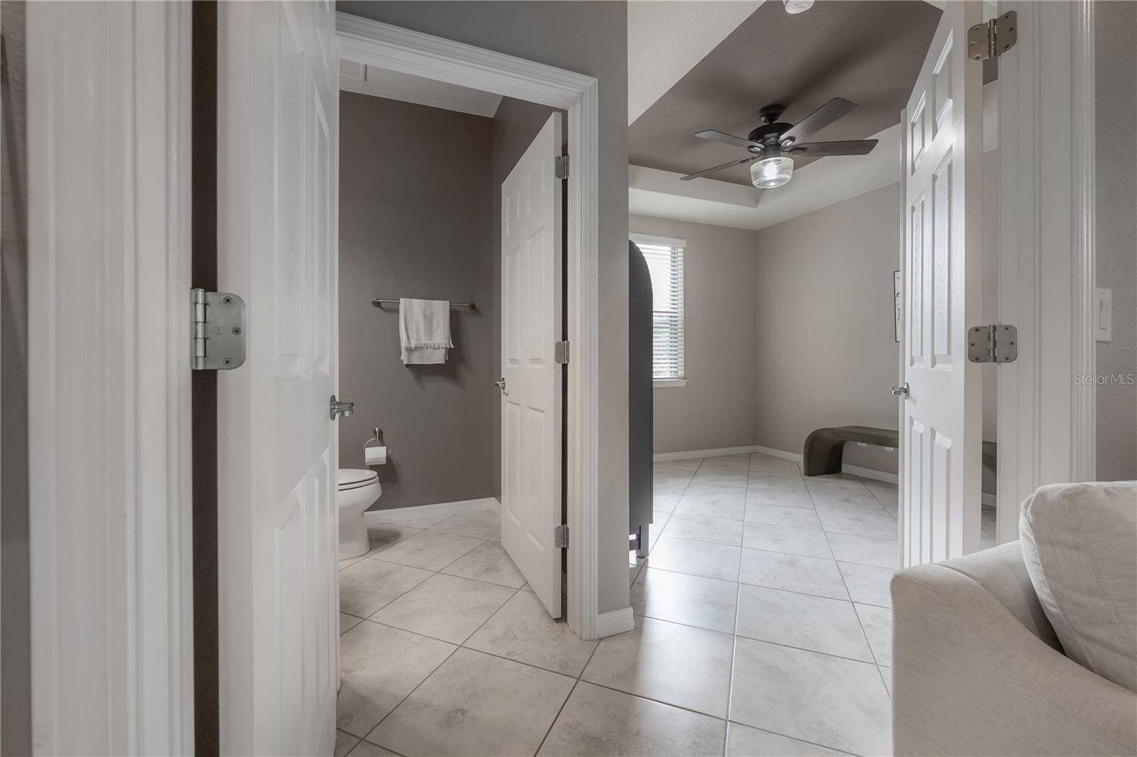 Double door entry to downstairs bedroom/den and half bath