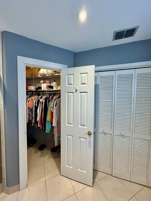 Master Bedroom Walk In His & Her Closets