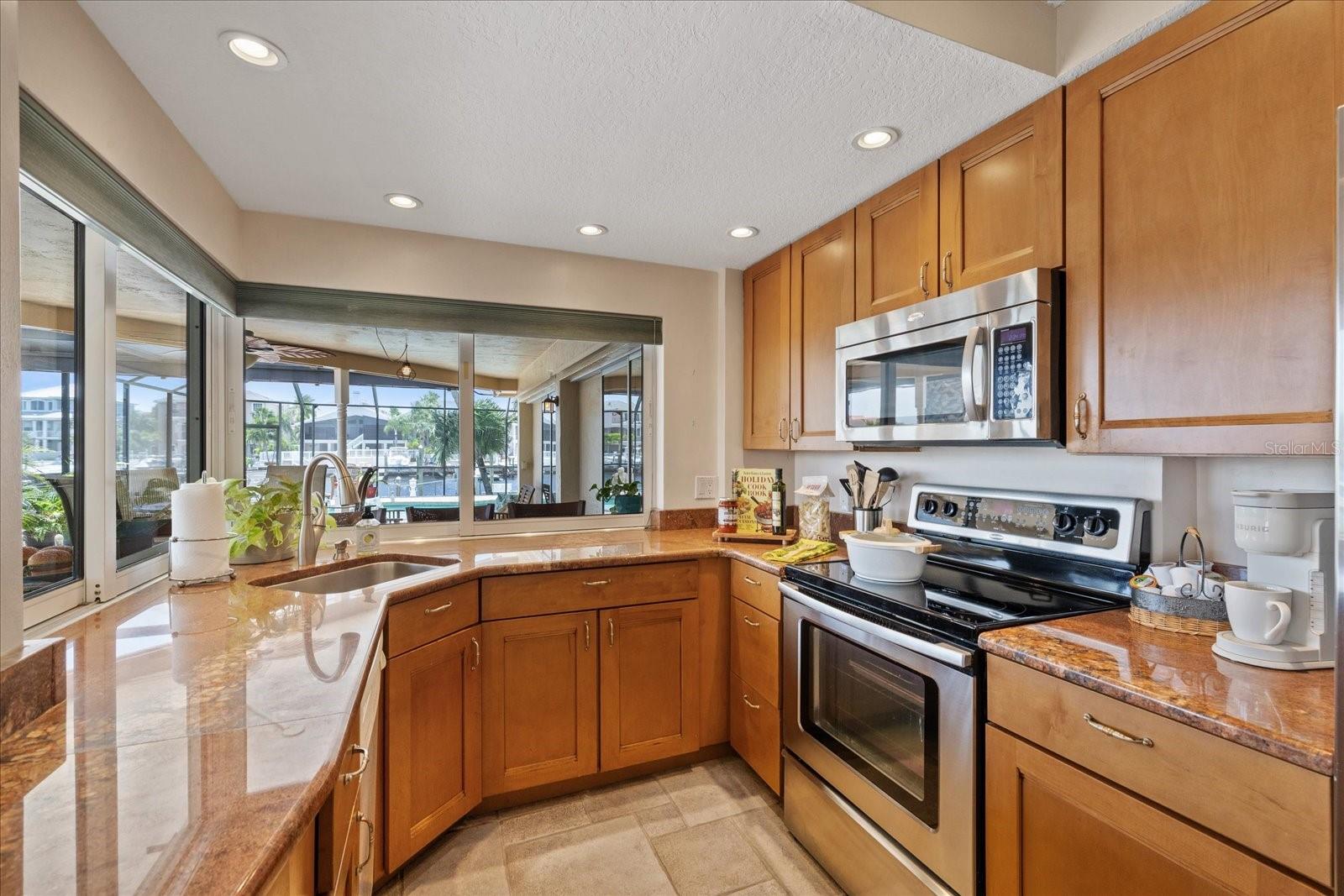 Kitchen with pass through windows