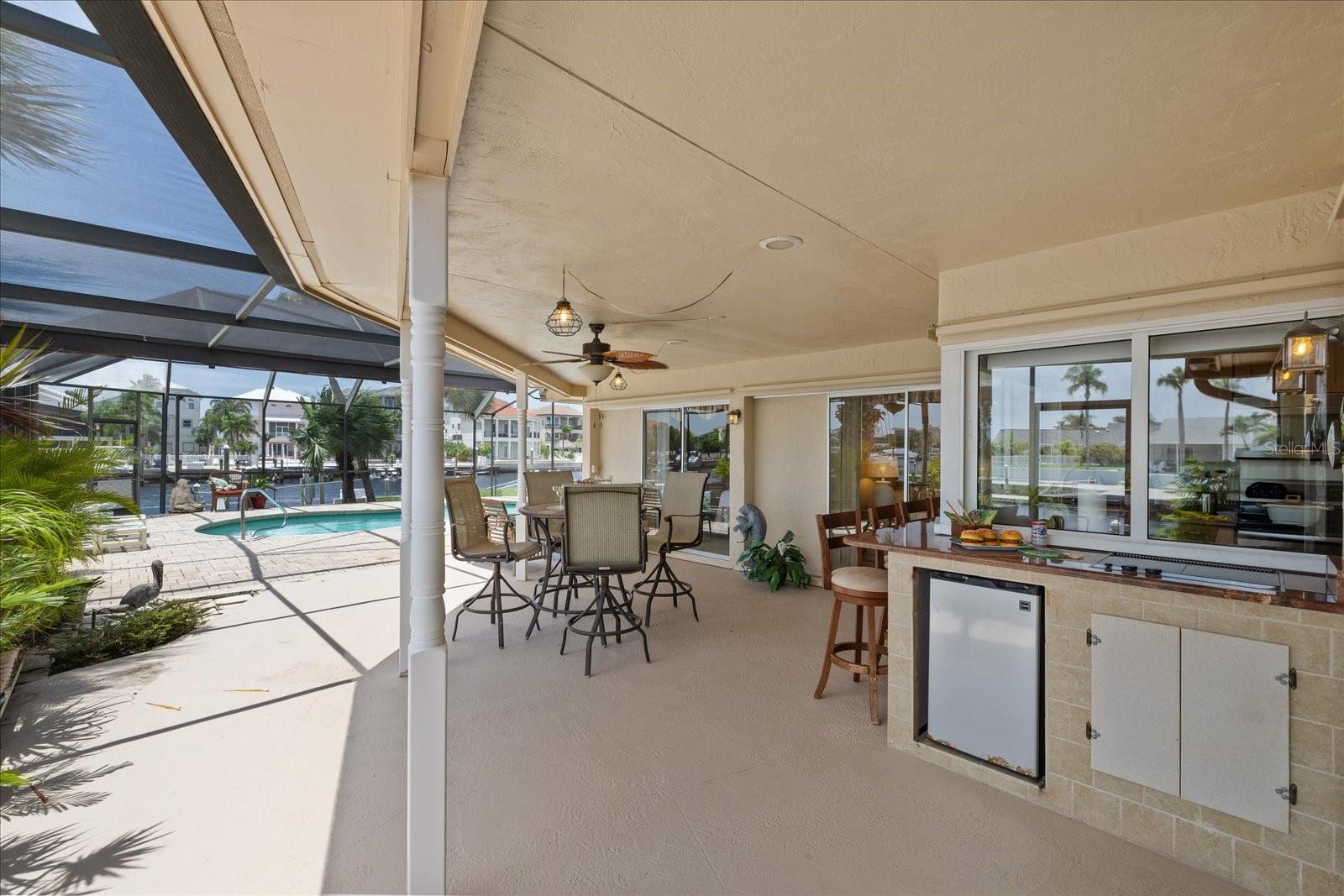 Expansive outdoor covered entertainment space