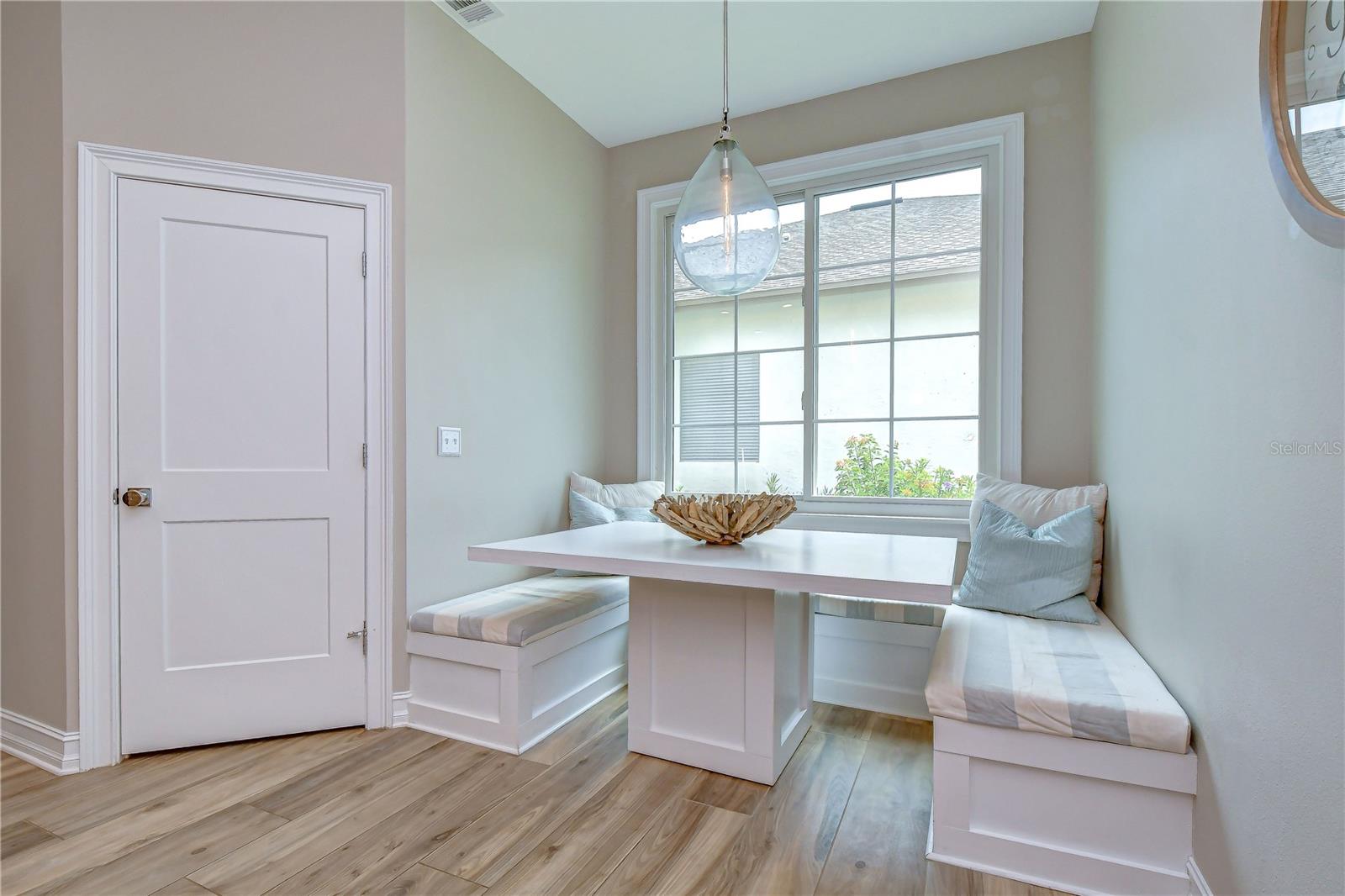 Custom-built breakfast nook for casual dining.