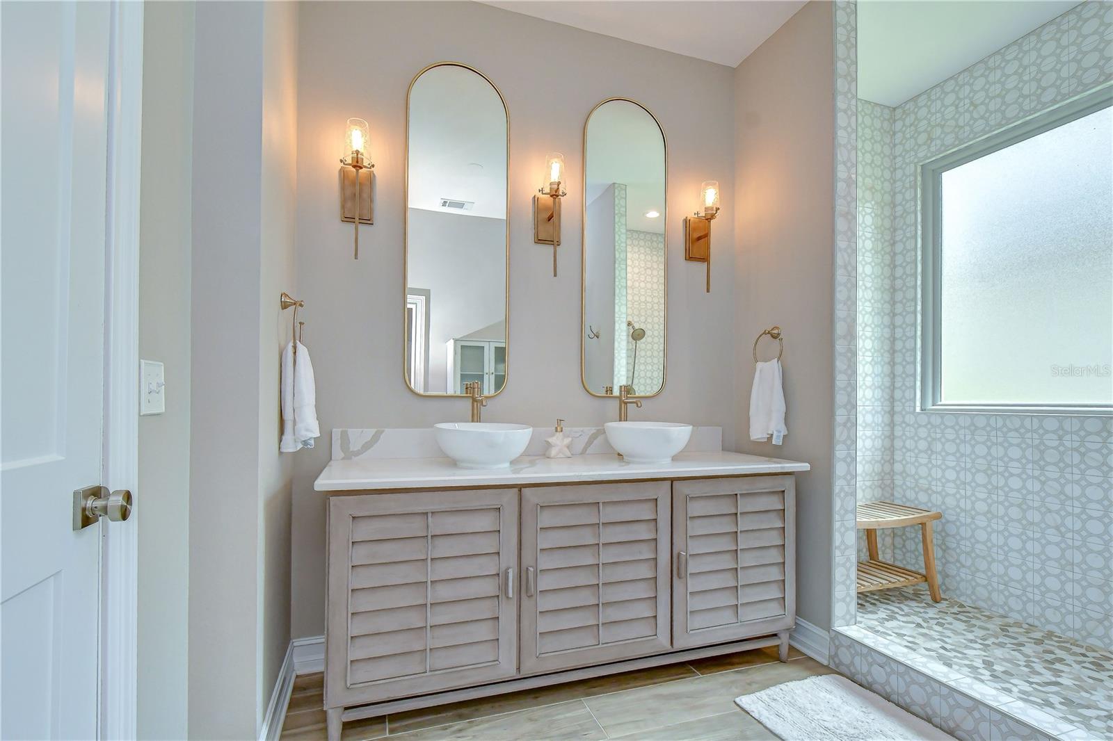 Luxurious spa-inspired en-suite.