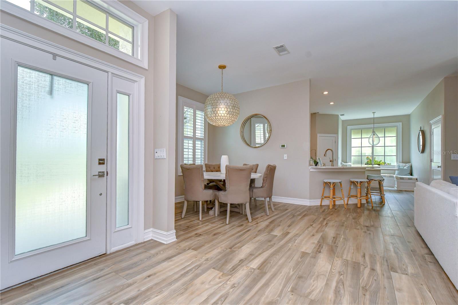 Welcoming entrance with soaring volume ceilings.