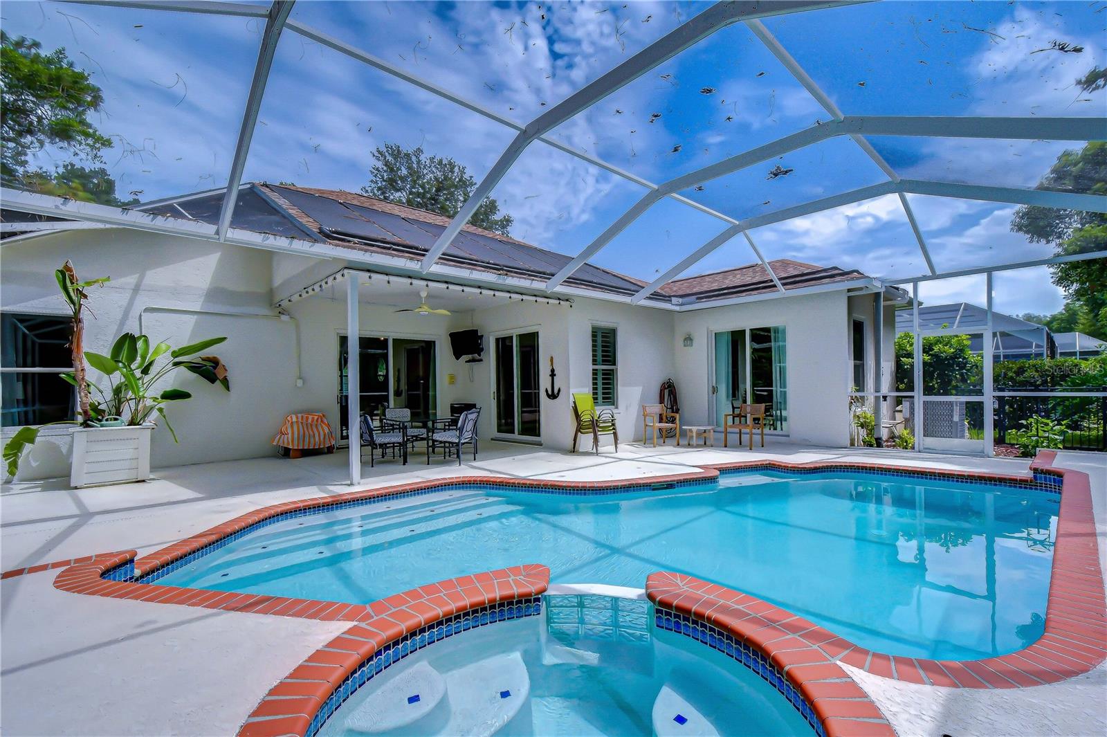 Solar-heated pool and relaxing spa.