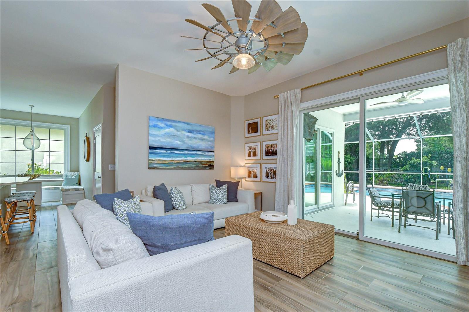 Expansive Anderson windows and doors overlooking the pool.