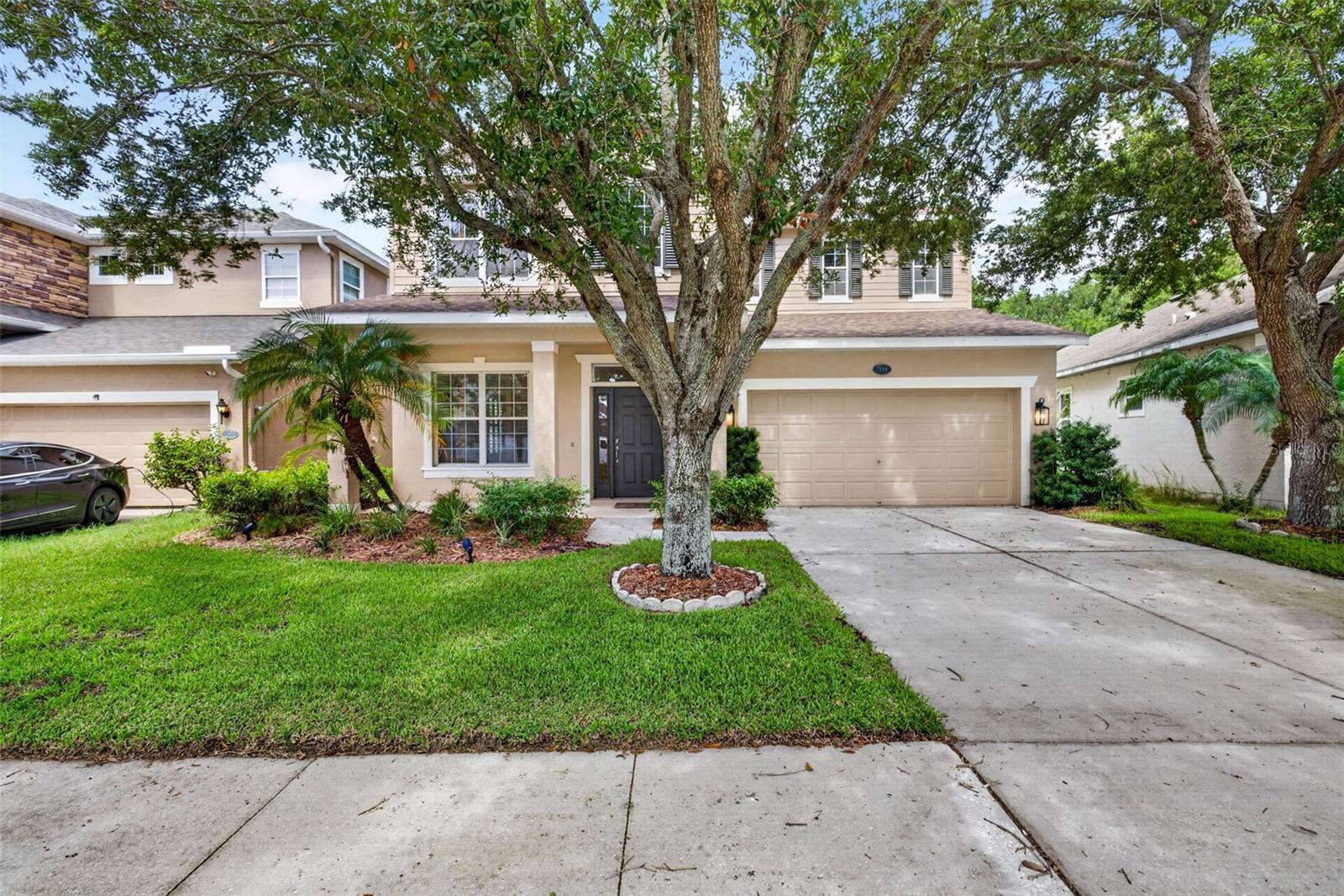 Front Exterior with mature oak tree