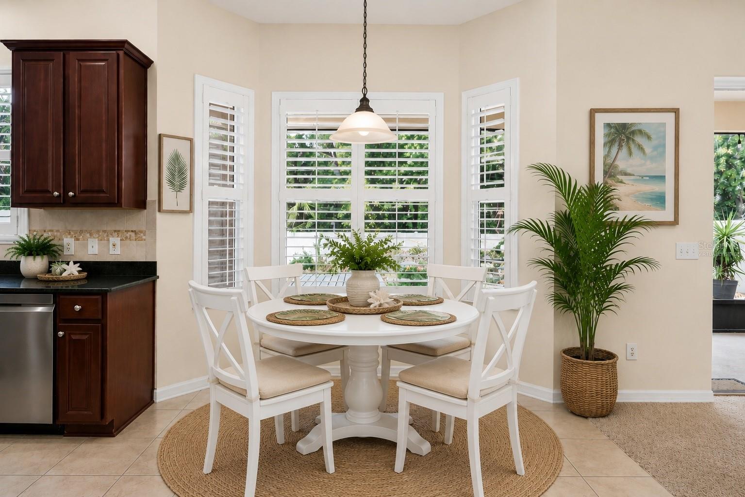 Dine in kitchen area. Virtually staged