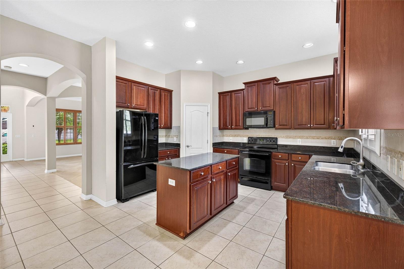 Kitchen with granite countertops and 42" cabinets