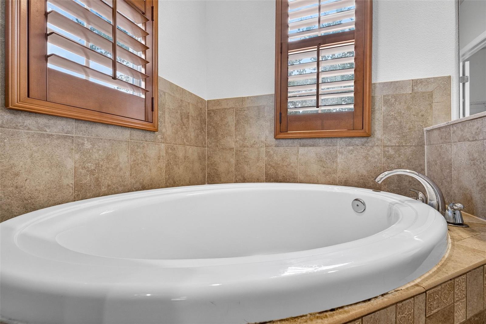 Soaking tub in primary bathroom