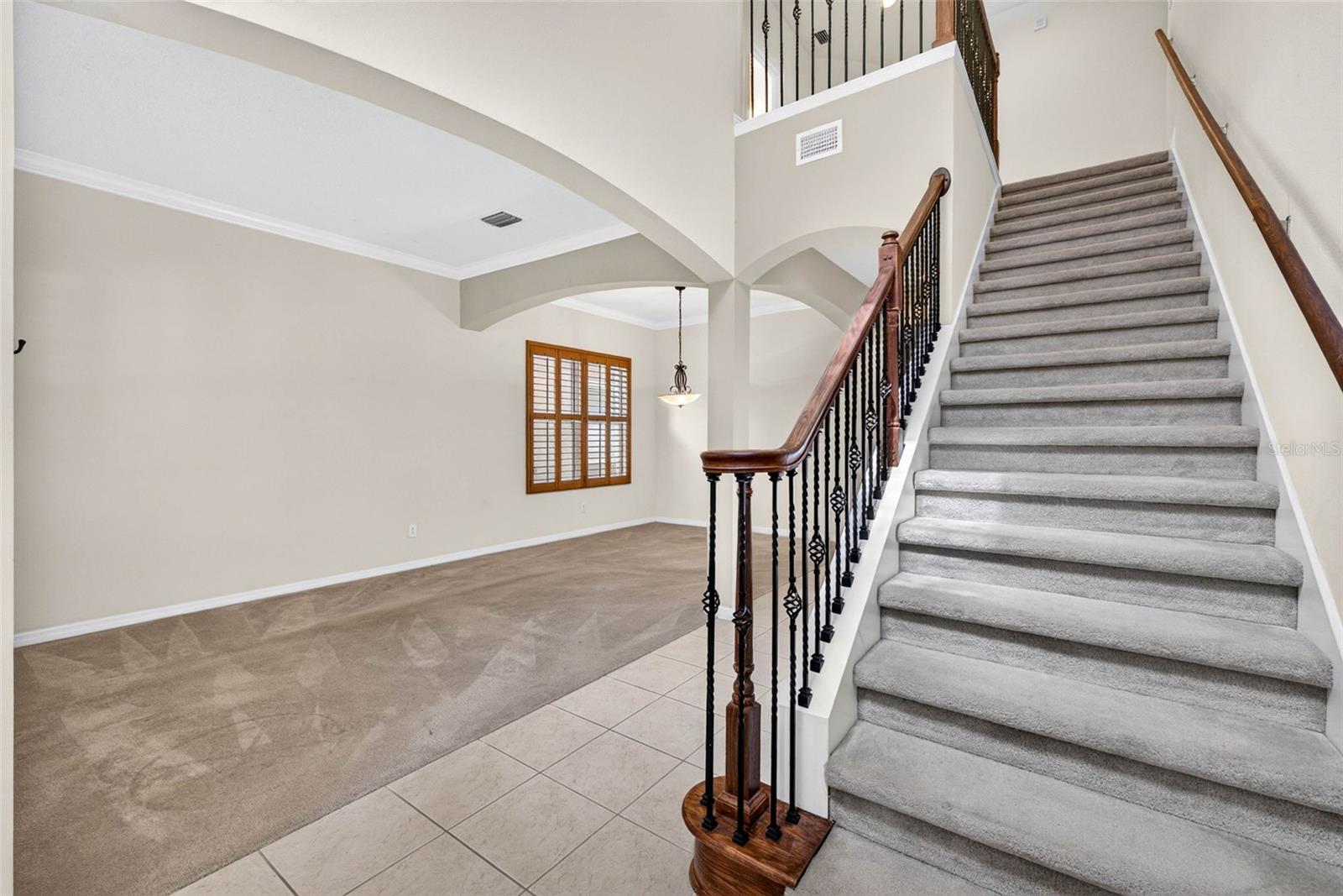 Foyer with staircase. Decorative banister for stairs