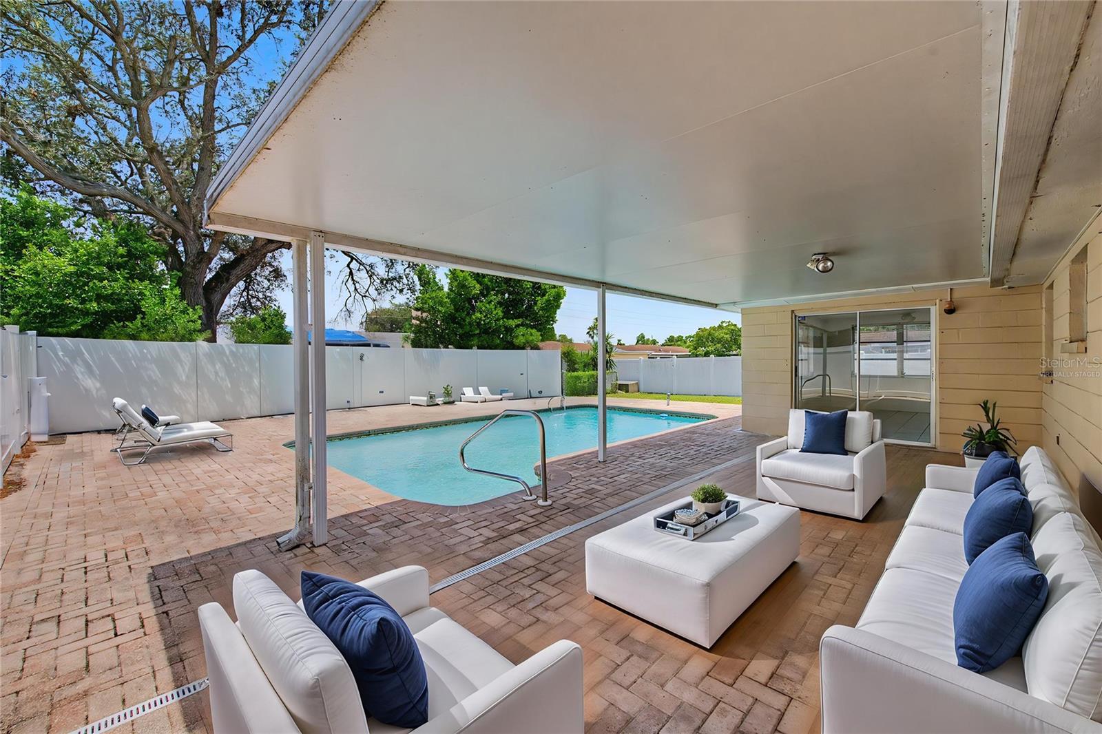 Pool & Covered Patio with Paver Deck - This photo has been virtually staged