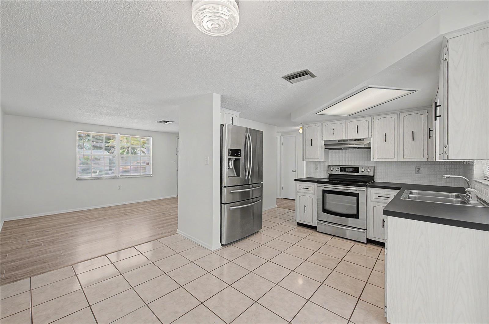 Dining Area & Kitchen - 9830 Rainbow Lane