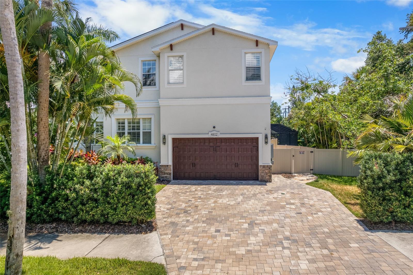 Garage entrance from the side of the house with ample space on drive way for parking
