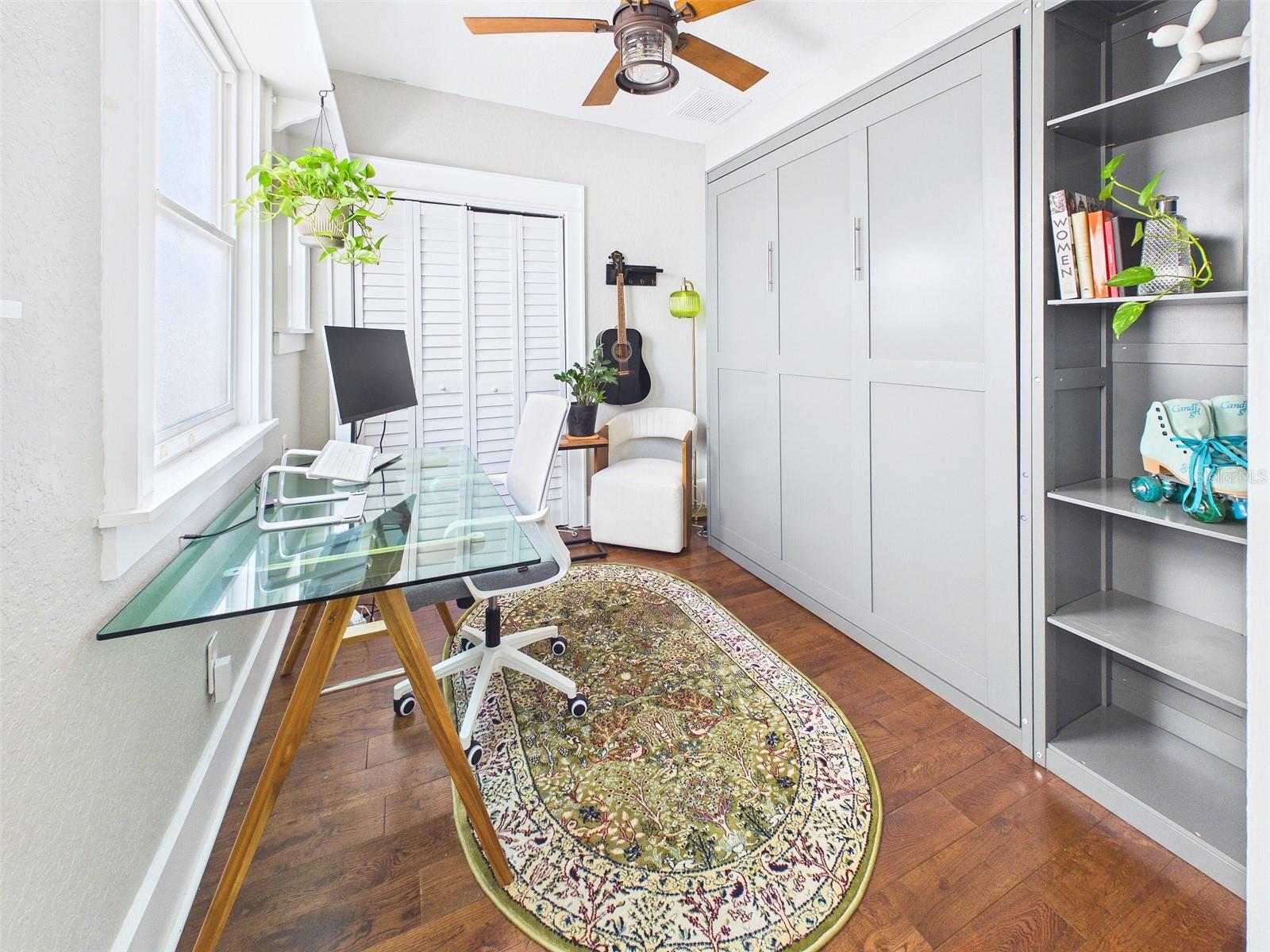 Guest bedroom comes with murphy bed