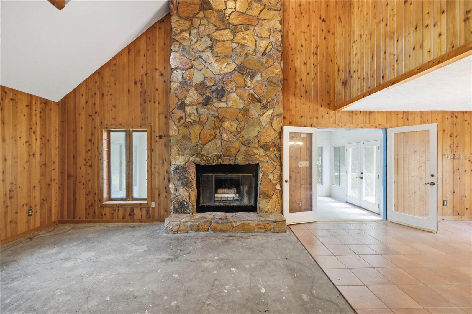 Wood-burning fireplace near front of home