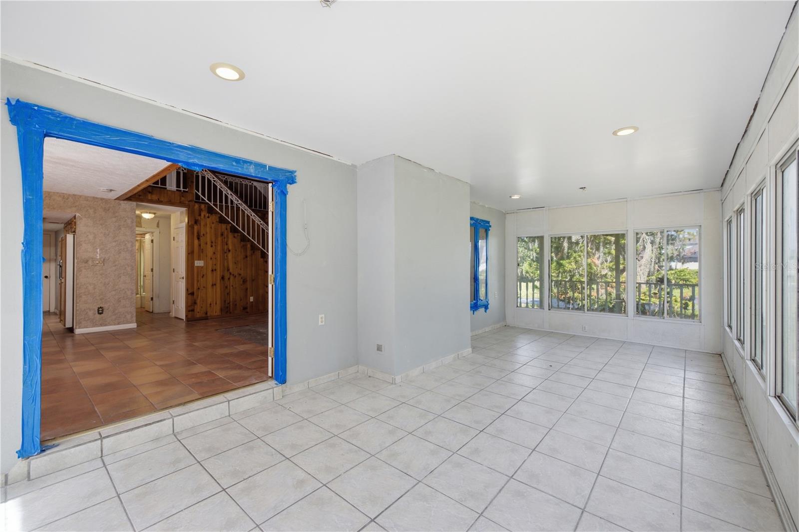 Florida room on left-side of home