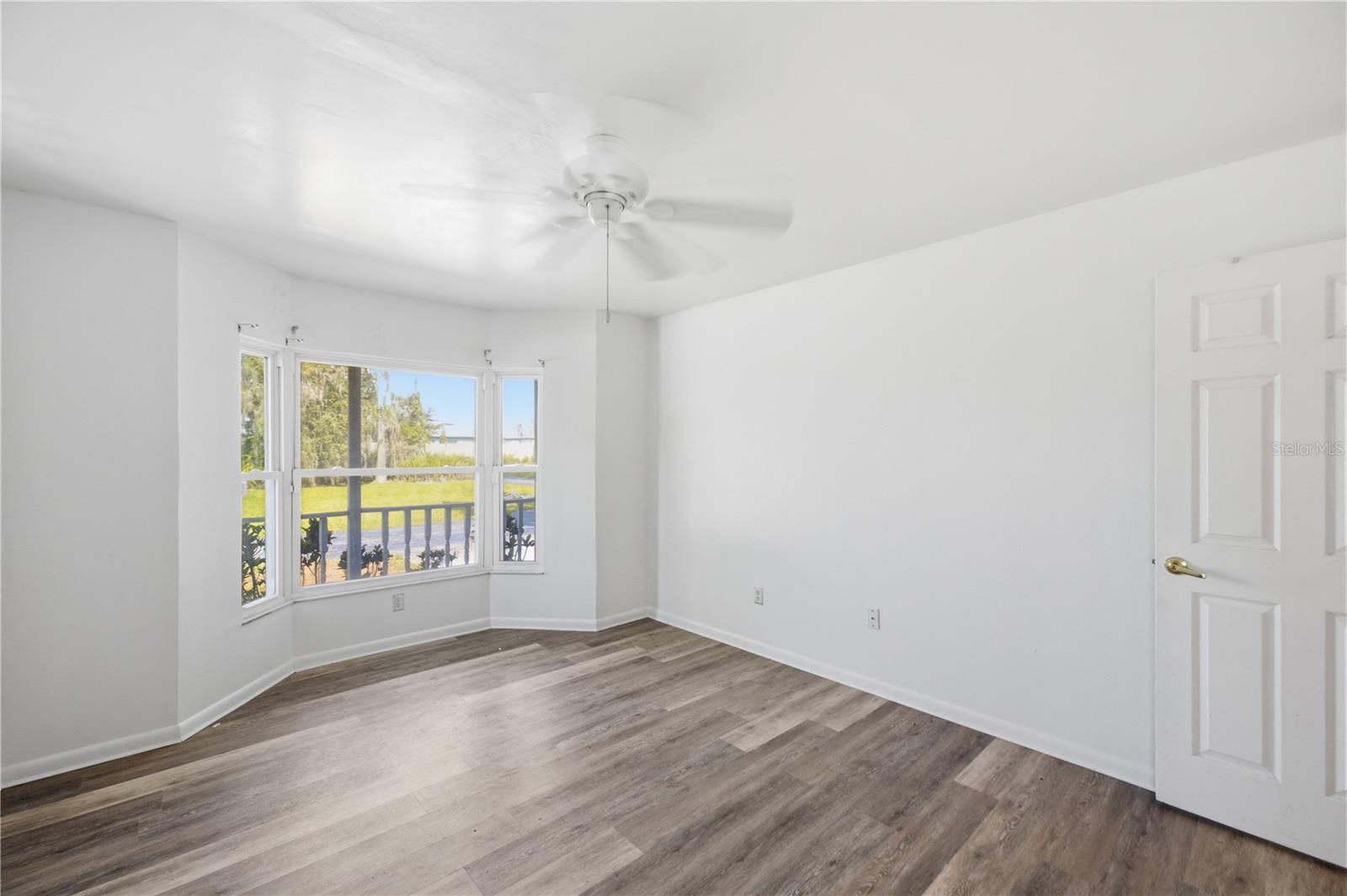 Downstairs bedroom looking to front of property