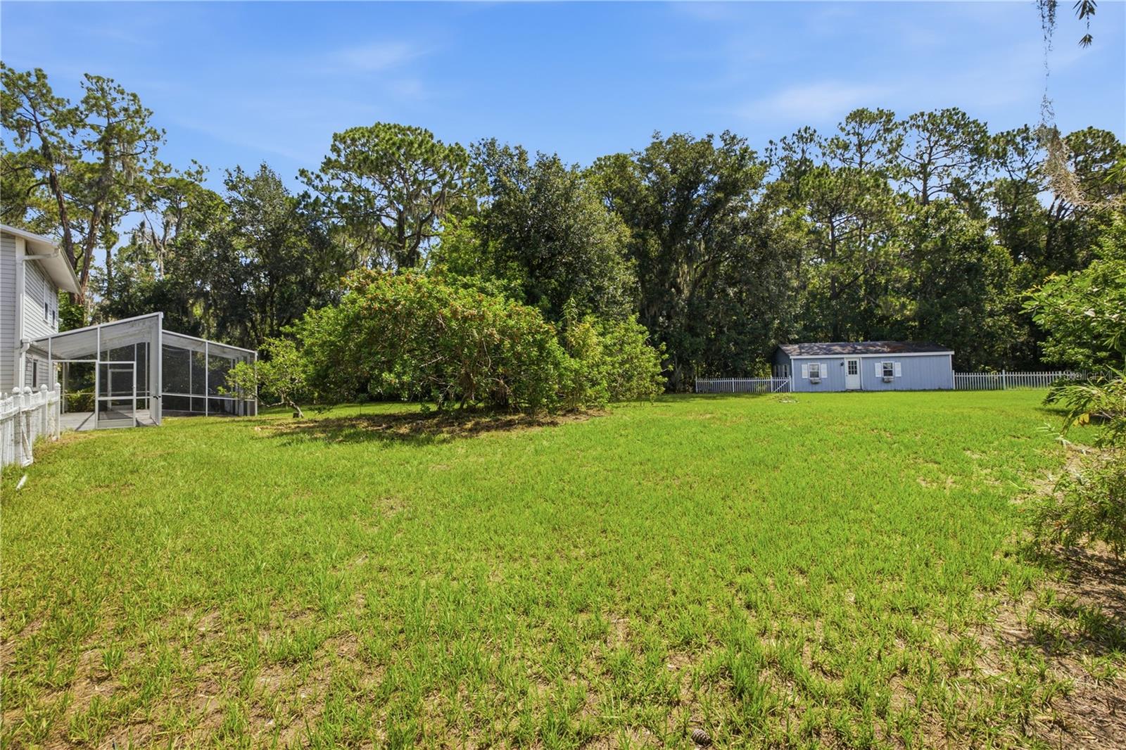 5.08 acres contains home and shed