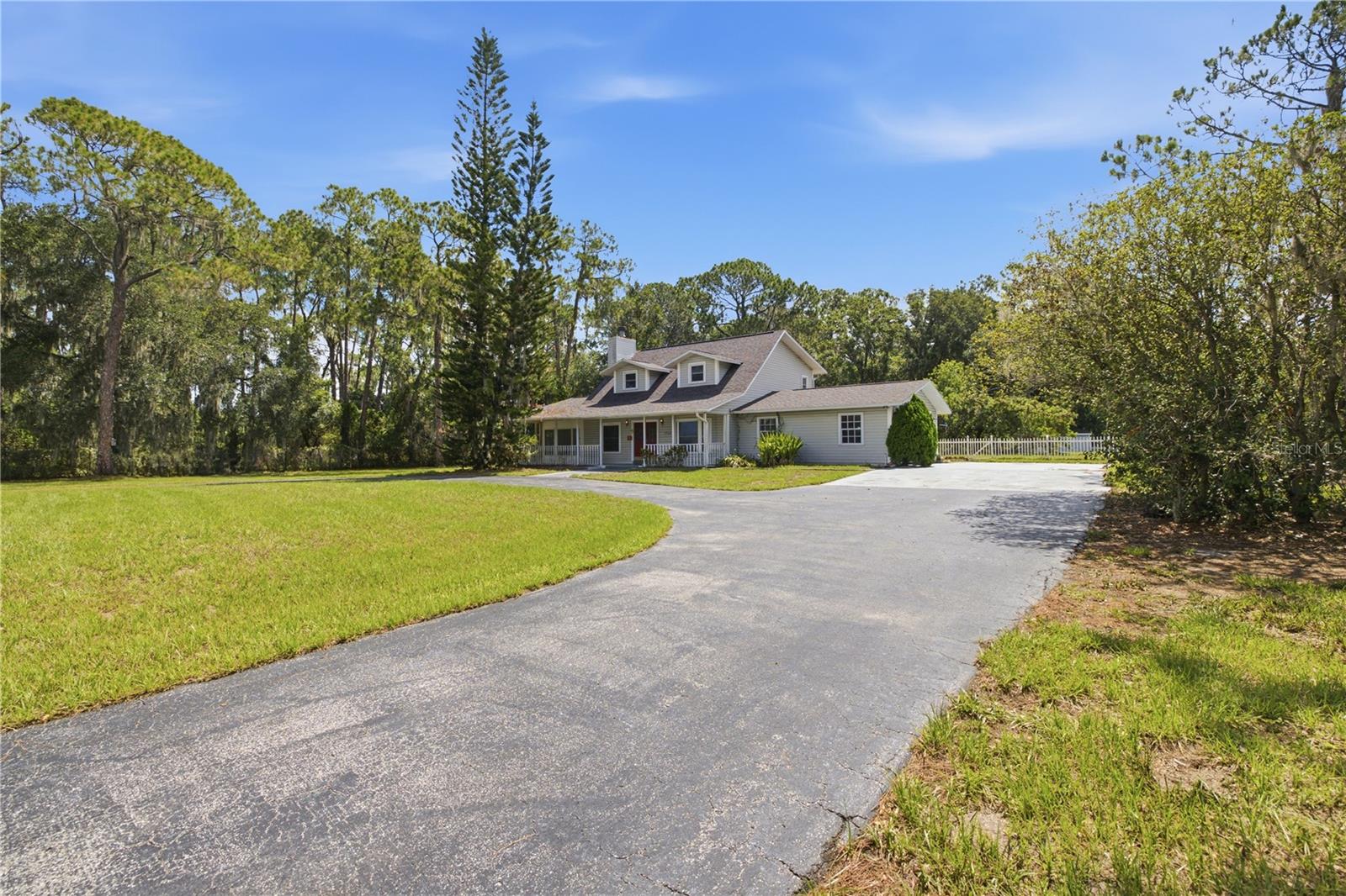 Front left side entrance with circular driveway