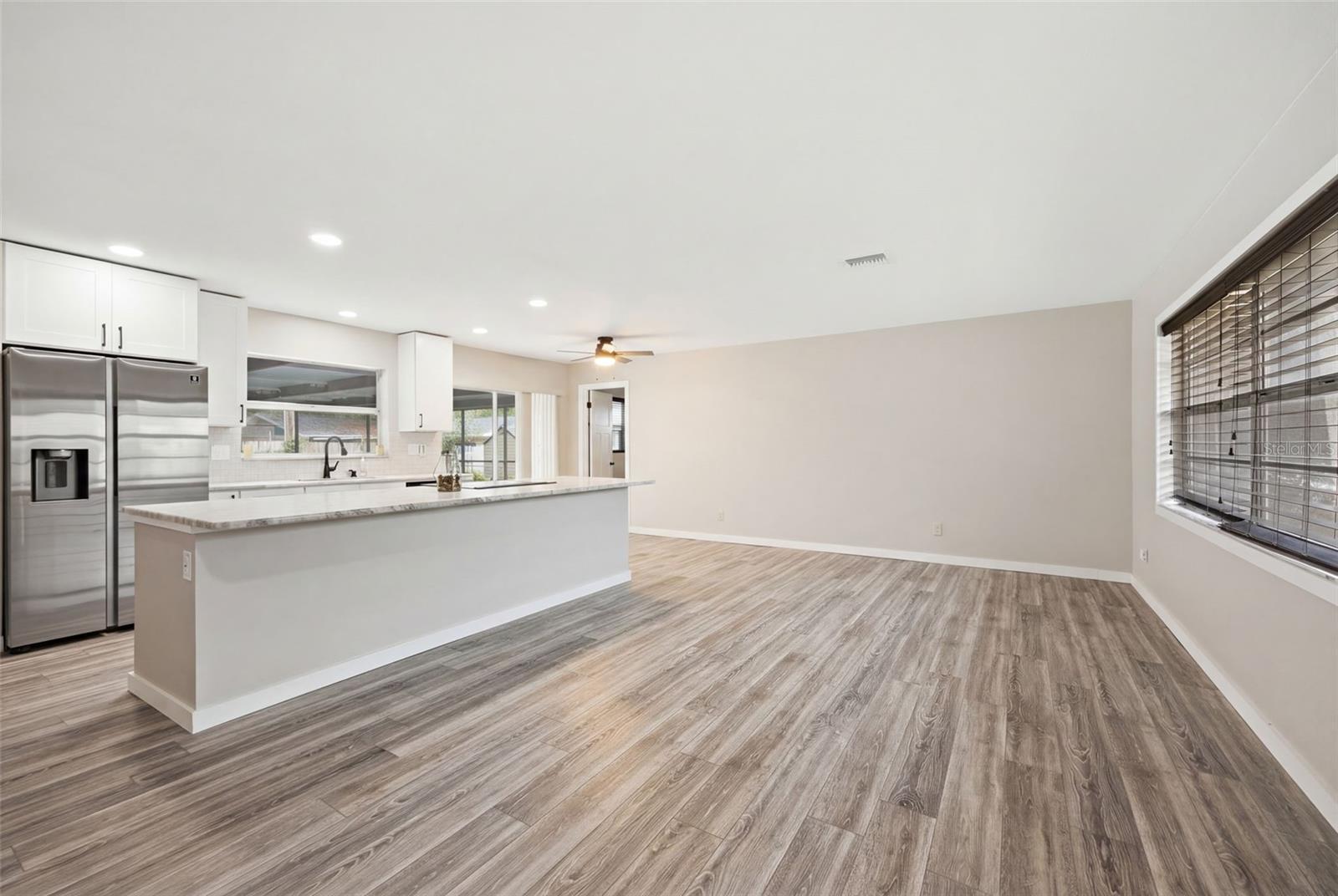 Open concept family room, kitchen, breakfast area or office space