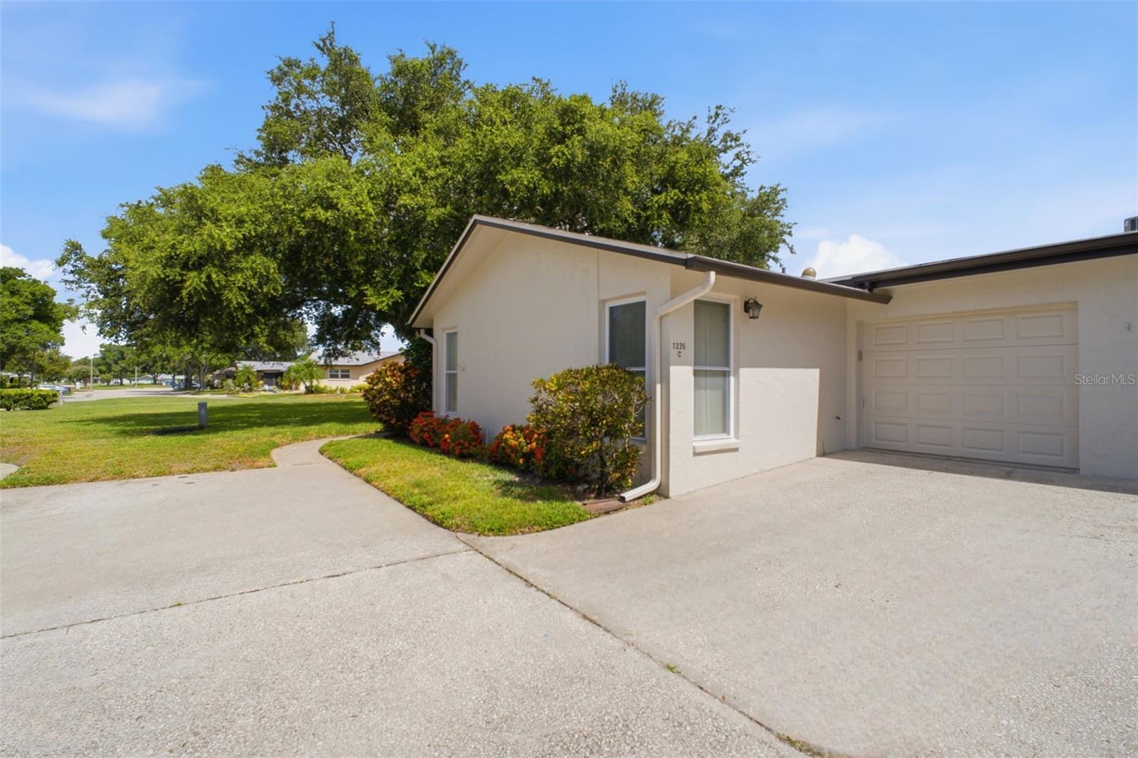 Tucked away from the main road with both an attached garage and additional parking space~