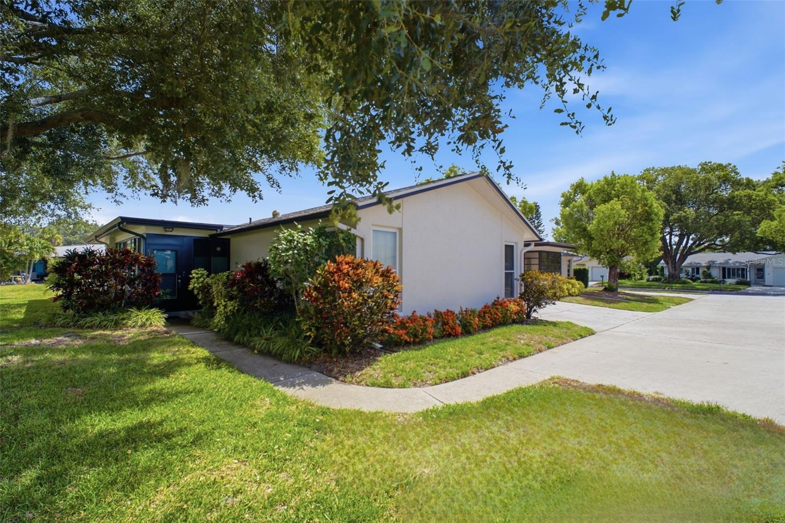 Perfectly located with additional parking by the front walkway and additional parking in front of the attached garage~