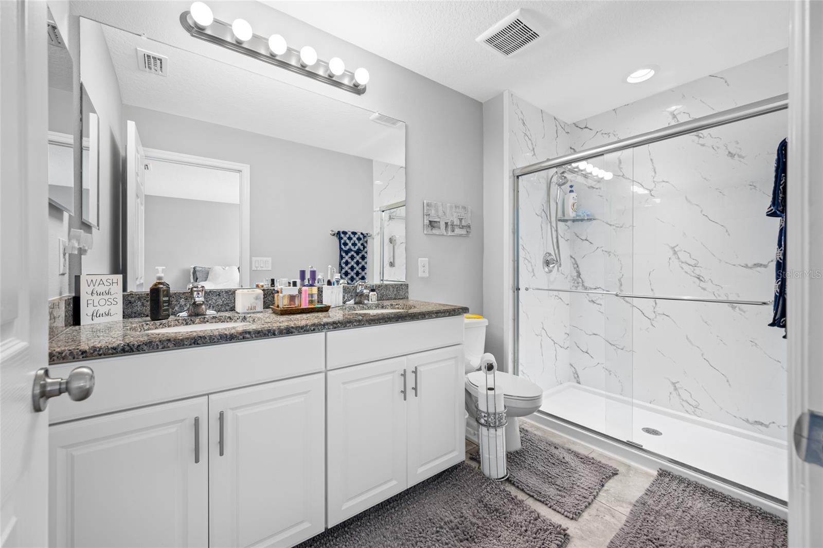Ensuite primary bedroom bathroom