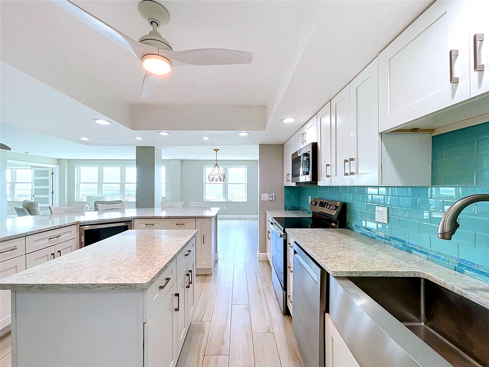 Light and bright, the impact windows allow plent of light to shine through the entire condo.
