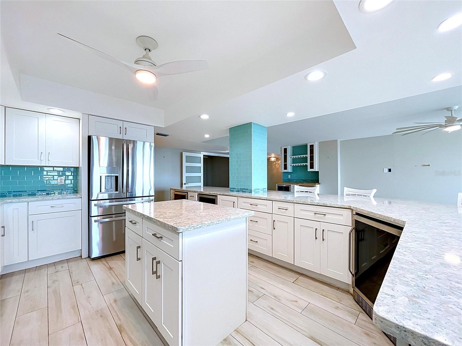Light and bright, the impact windows allow plent of light to shine through the entire condo.