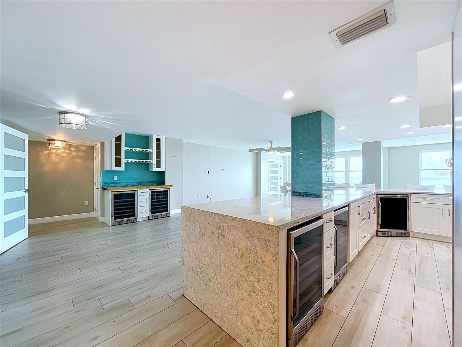 Light and bright, the impact windows allow plent of light to shine through the entire condo.
