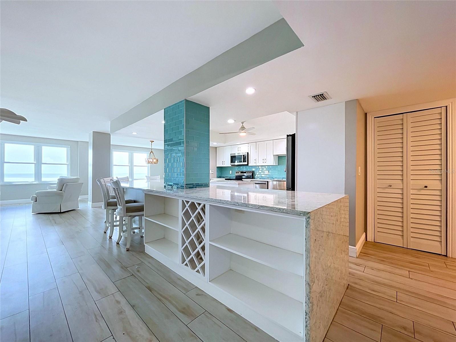 Light and bright, the impact windows allow plent of light to shine through the entire condo.