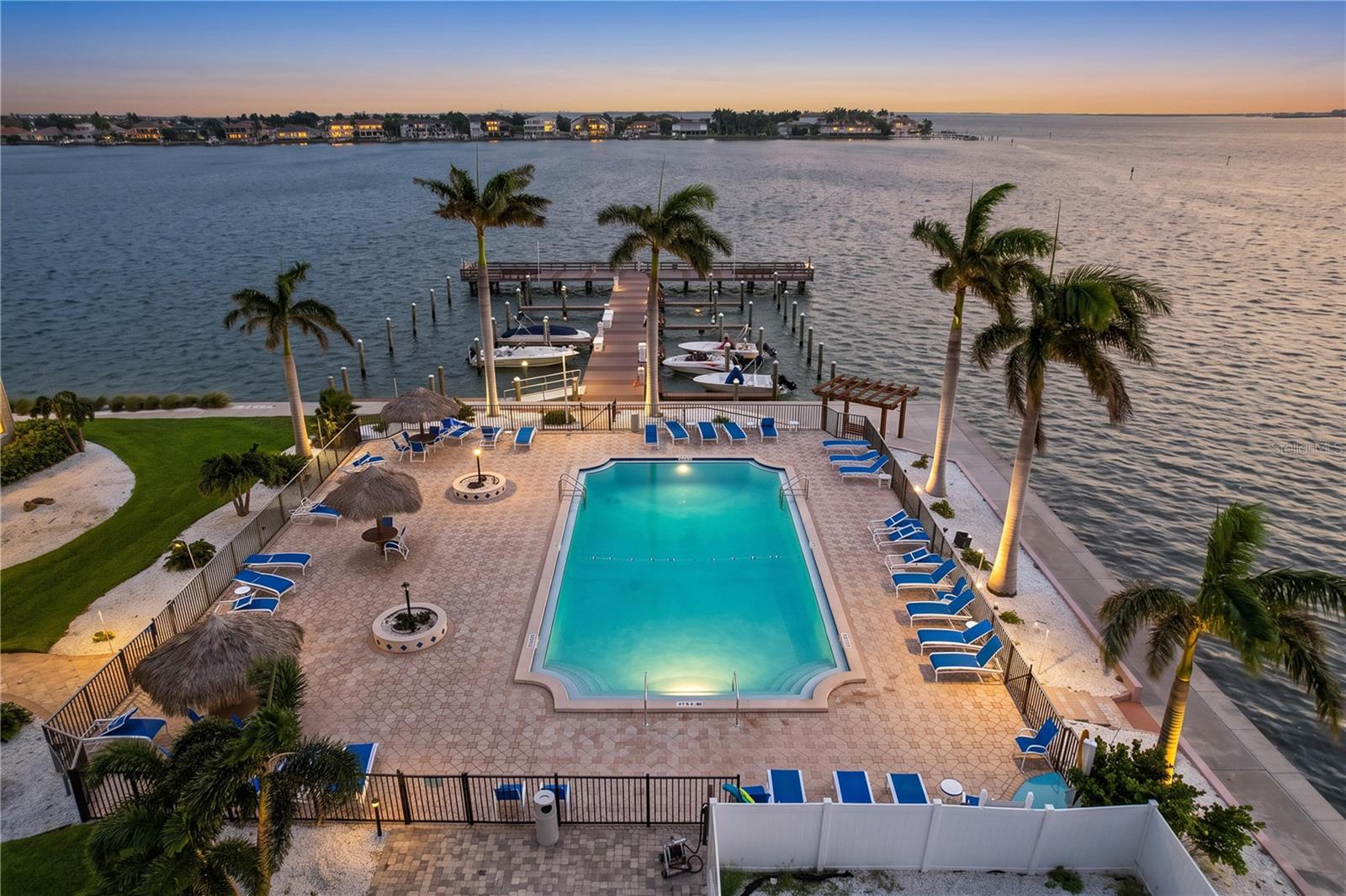 Enjoy 4 heated waterfront pools on the Point Brittany property.