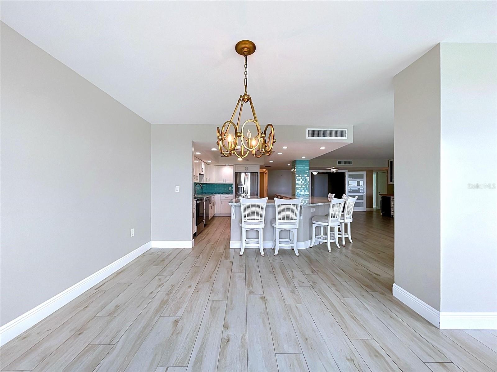 Spacious dining room with waterfront views.